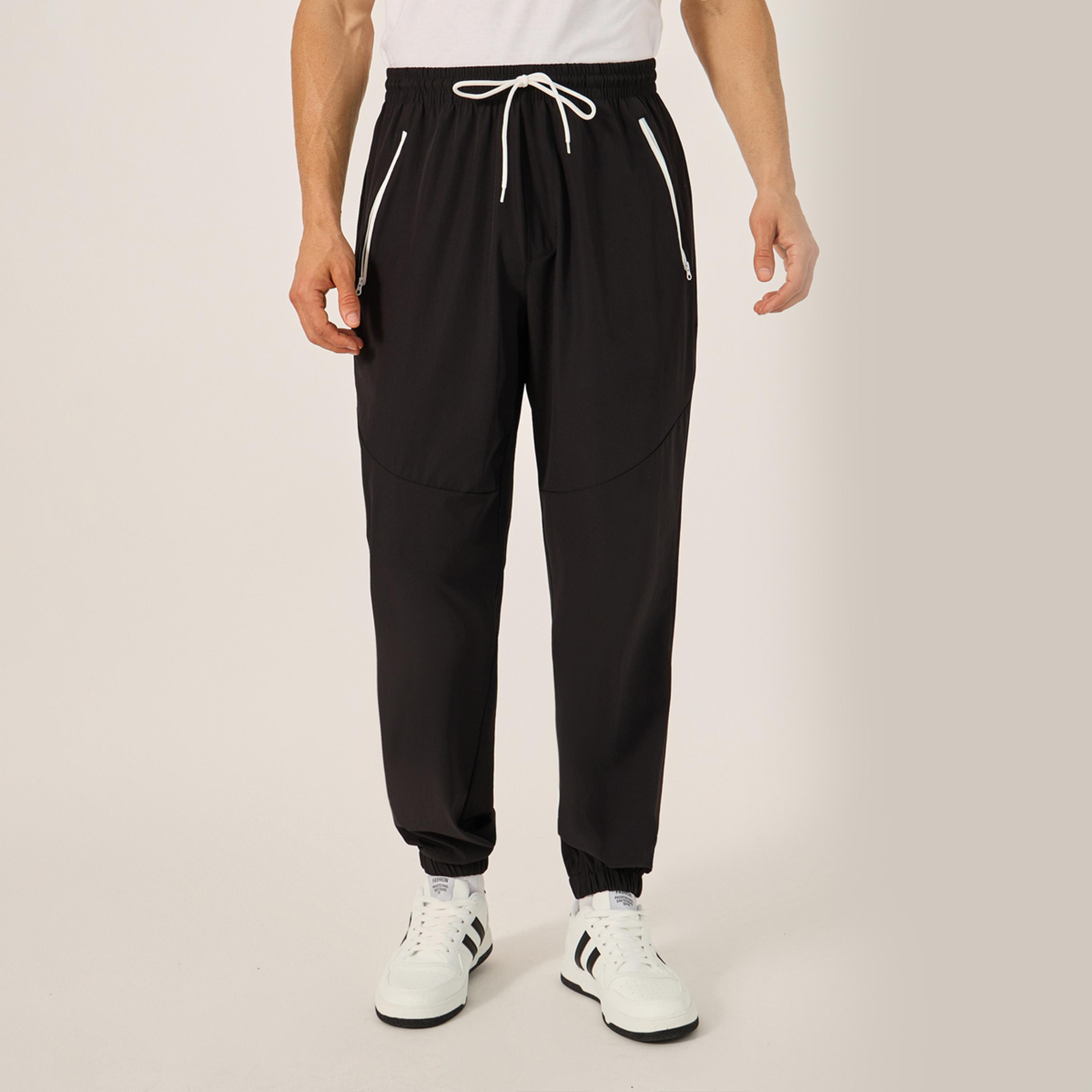 Styli Solid Relaxed Fit Elasticated Cuff Joggers with Contrast Zip detail-men-clothing-bottoms-joggers-image-1