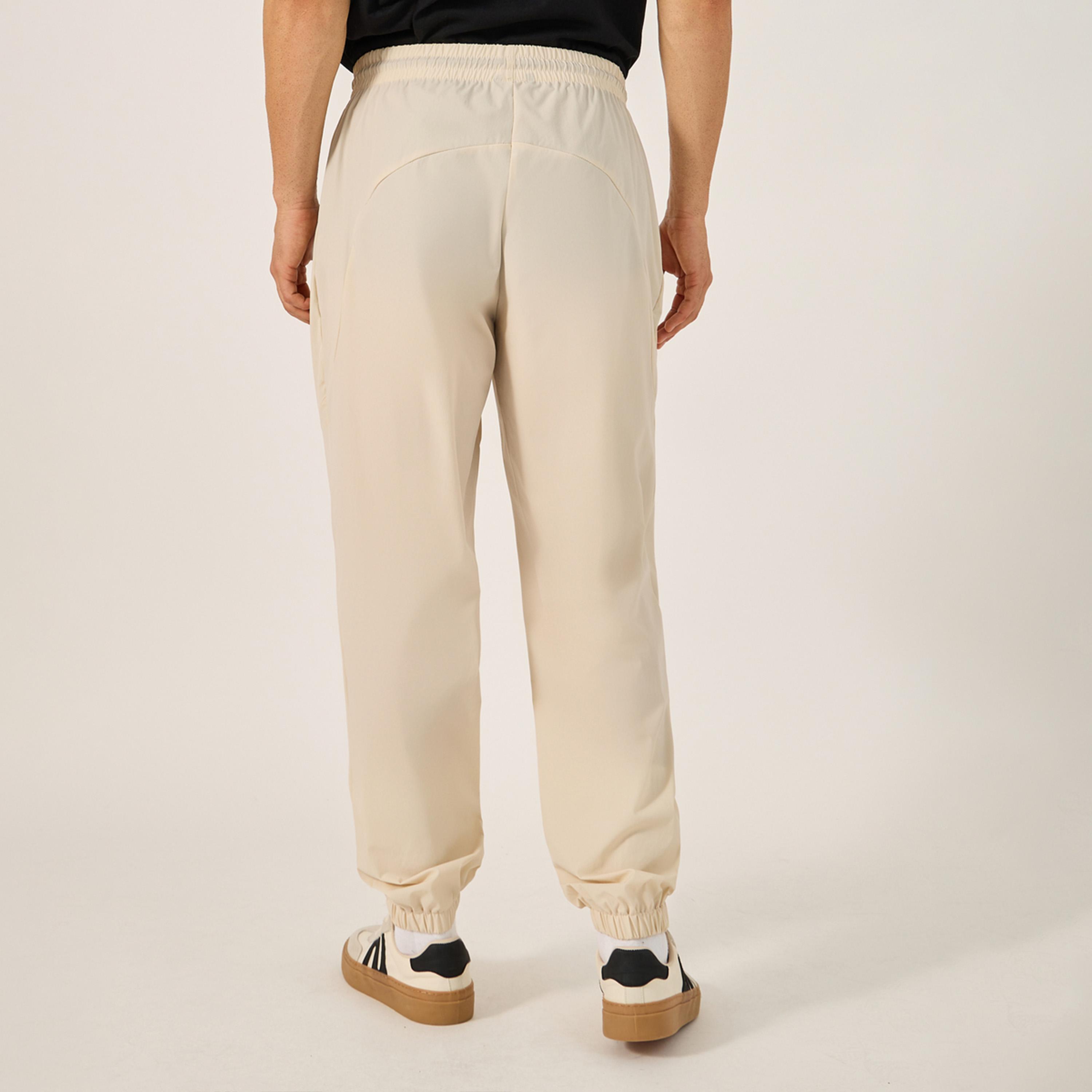 Styli Solid Relaxed Fit Elasticated Cuff Joggers with Contrast Zip detail-men-clothing-bottoms-joggers-image-4