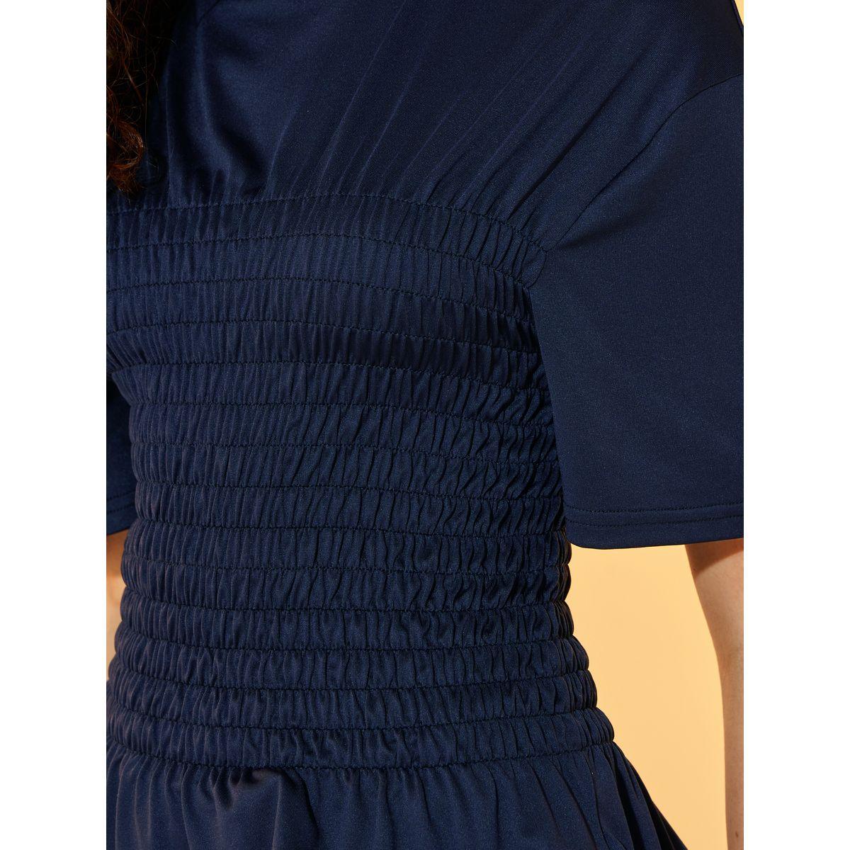 بلوزة بيبلوم سادة بتفاصيل مُجمعة وأكمام قصيرة-women-clothing-tshirts-image-2