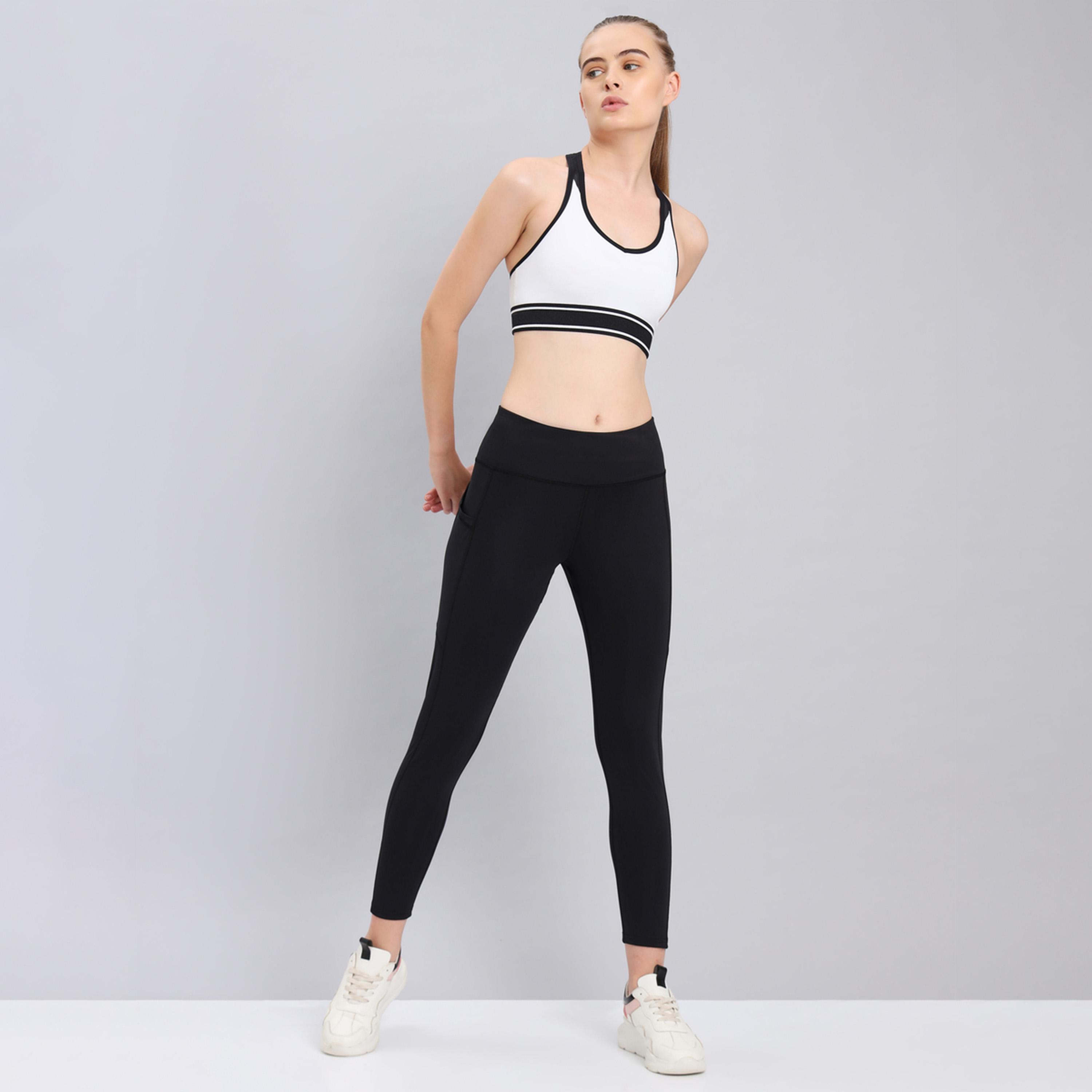 تكنو سبورت × ستايلي - ليقنز بخياطة مكشوفة وطبعة شعار-women-clothing-sportswearandactivewear-bottoms-image-2