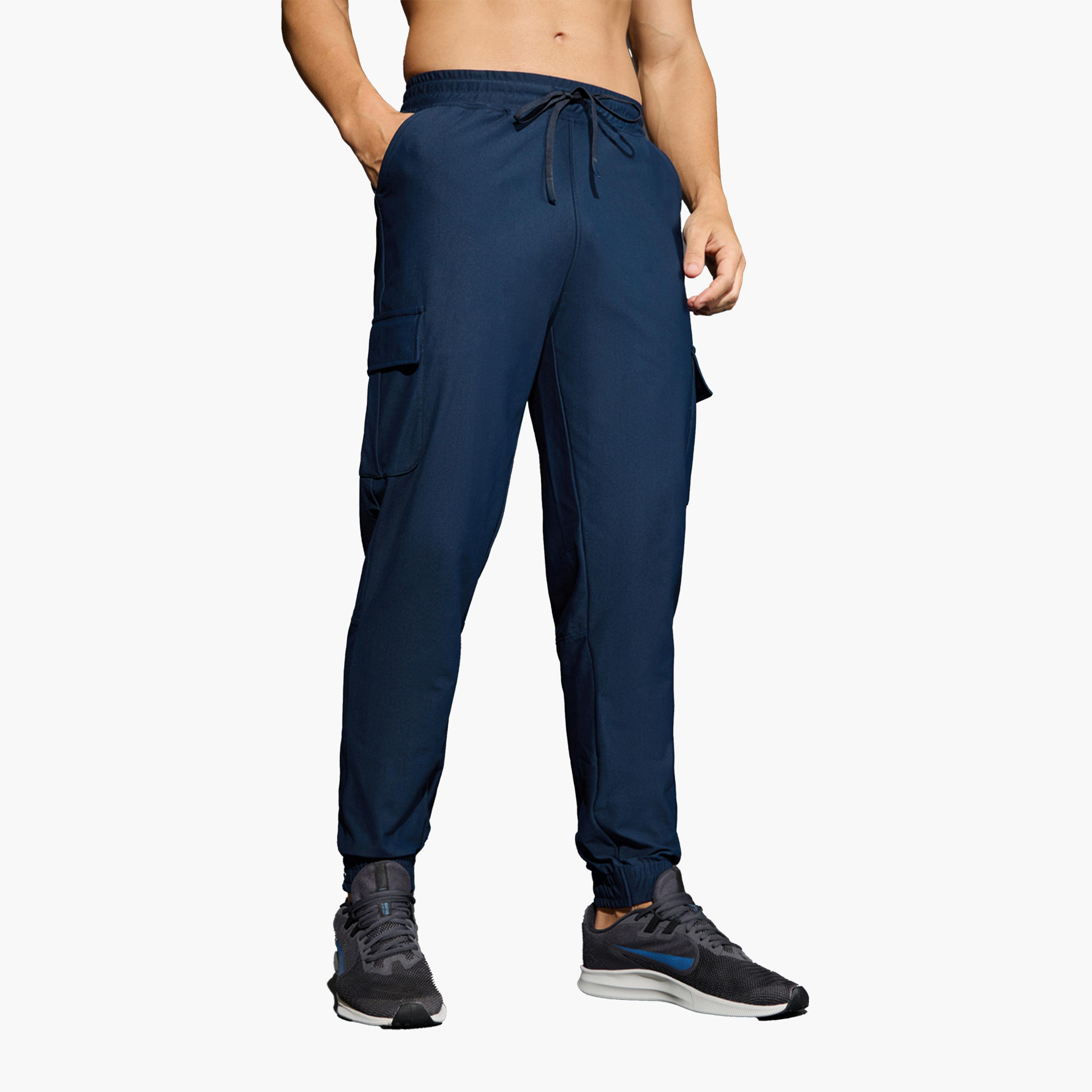 تيكنو سبورت × ستايلي - بنطال كارغو سادة قابل للتمدد في 4 اتجاهات-men-clothing-sportswearandactivewear-bottoms-joggers-image-4