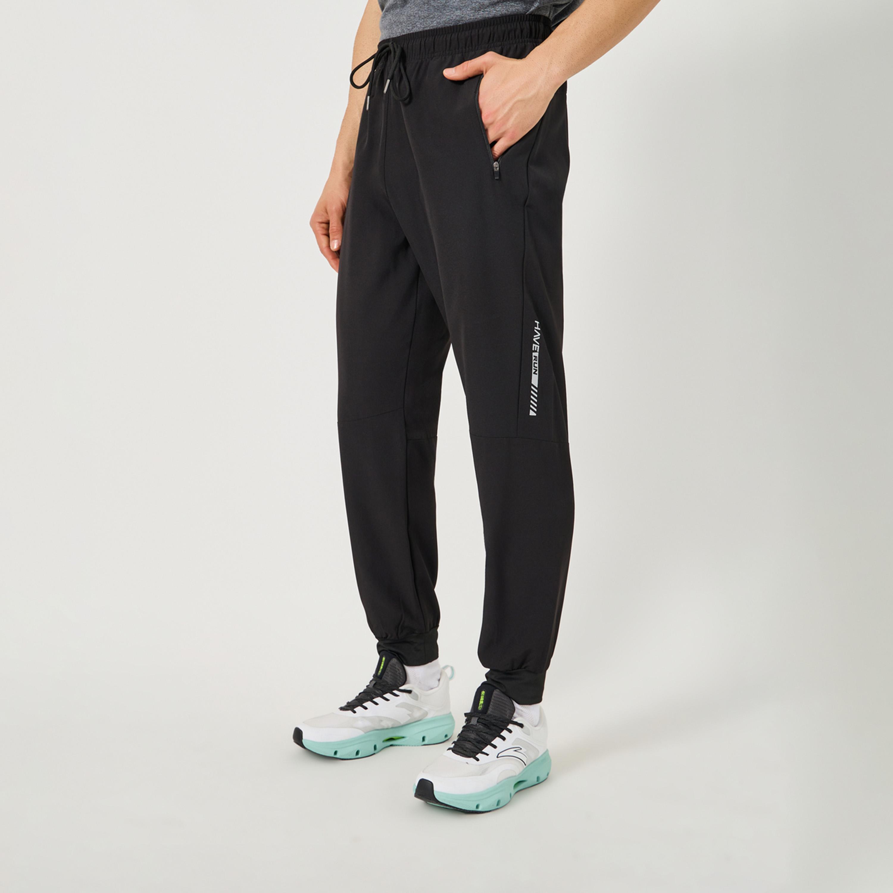ستايلي - بنطال رياضي ضيق بخصر متوسط الارتفاع مع رباط-men-clothing-sportswearandactivewear-bottoms-image-1