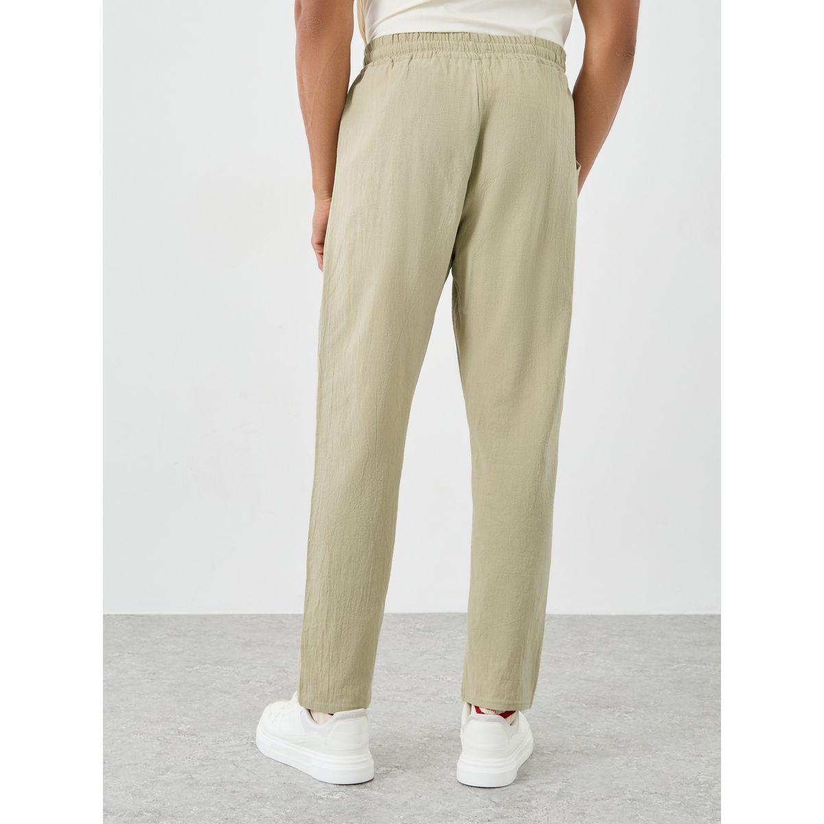 بنطال محبوك بقصة مريحة وتفاصيل أربطة-men-clothing-bottoms-joggers-image-4