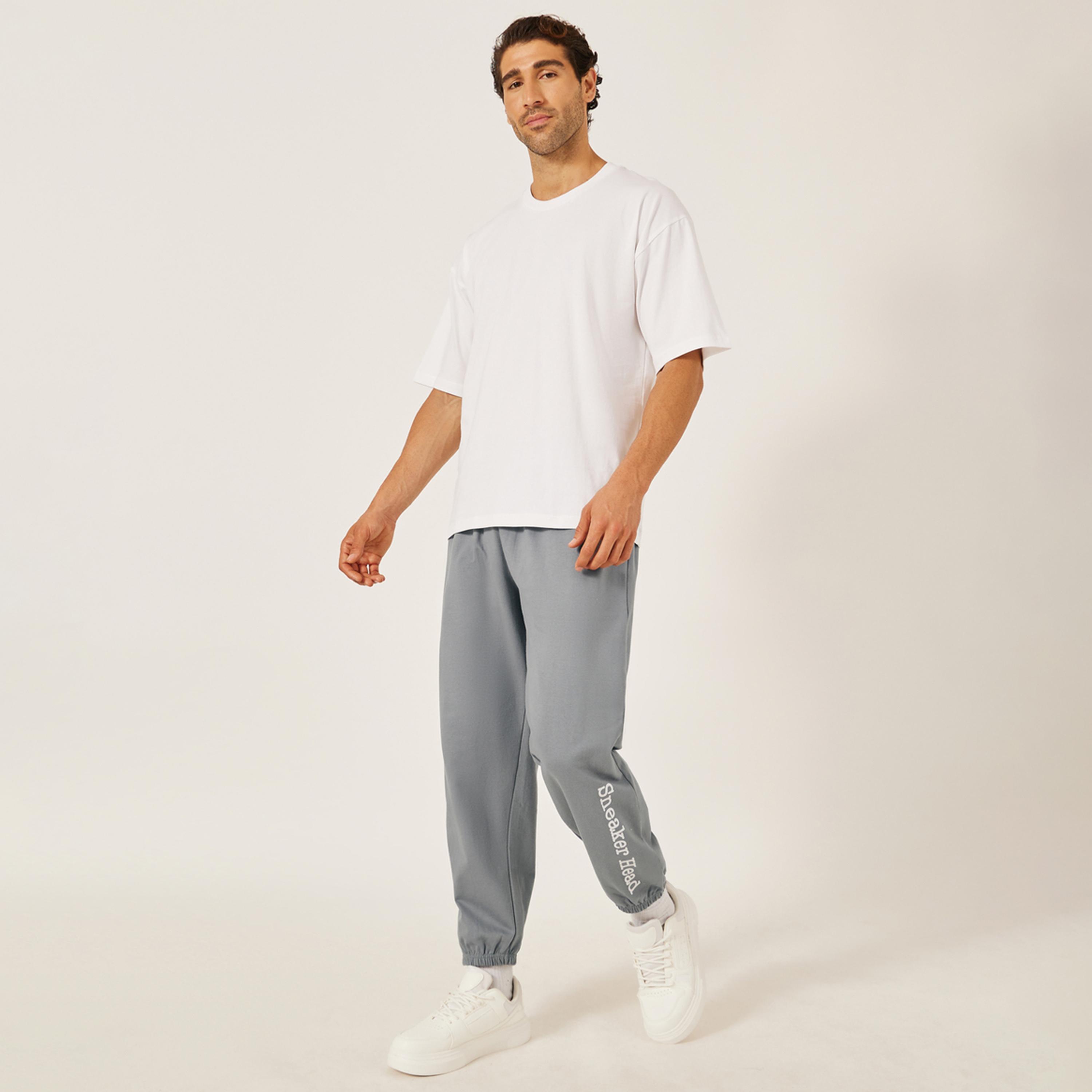 ستايلي - بنطال رياضي مريح من القطن بطباعة شعار-men-clothing-bottoms-joggers-image-2