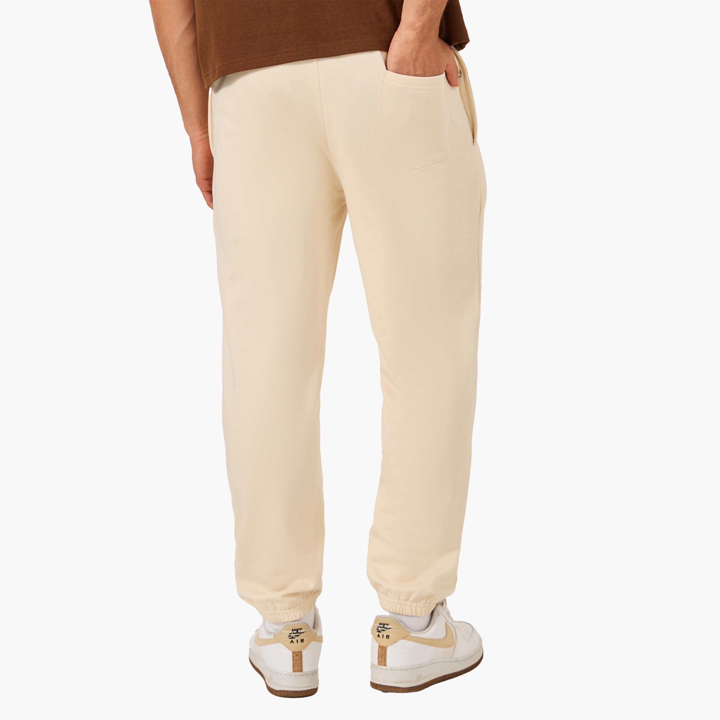 ستايلي - بنطال رياضي مريح بخصر متوسط الارتفاع مع تفاصيل شارة-men-clothing-bottoms-joggers-image-6