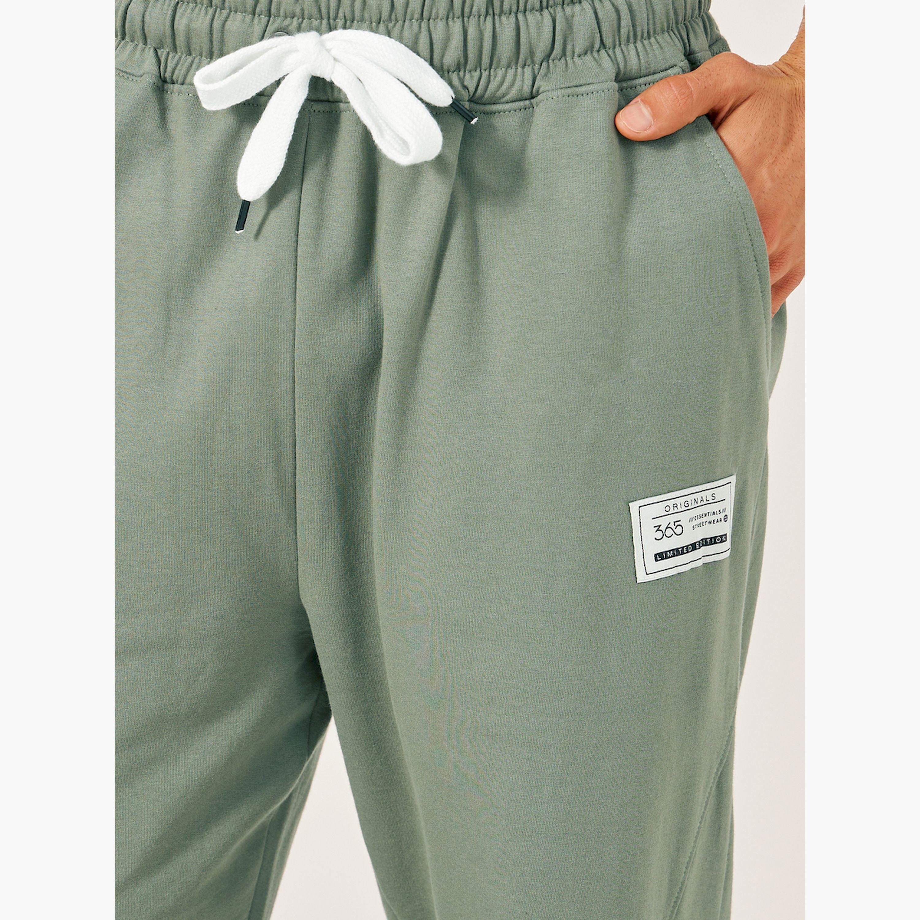 ستايلي - بنطال رياضي كبير الحجم بخصر متوسط الارتفاع ورباط-men-clothing-bottoms-joggers-image-3