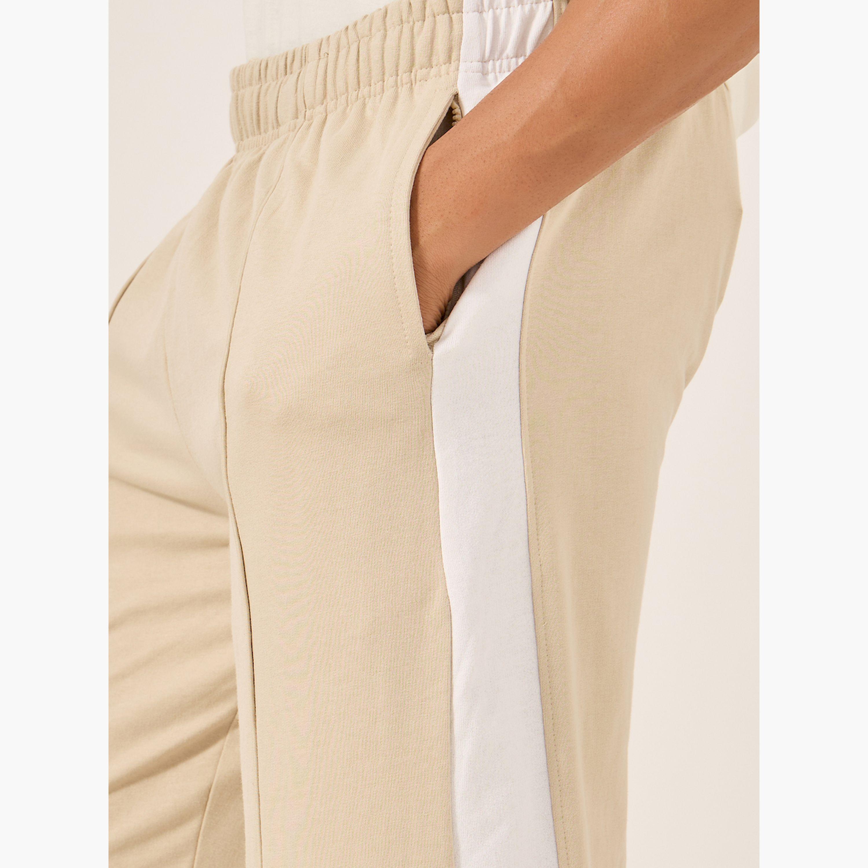 ستايلي -  بنطال رياضي مريح متوسط الارتفاع بتصميم جانبي متباين-men-clothing-bottoms-joggers-image-4