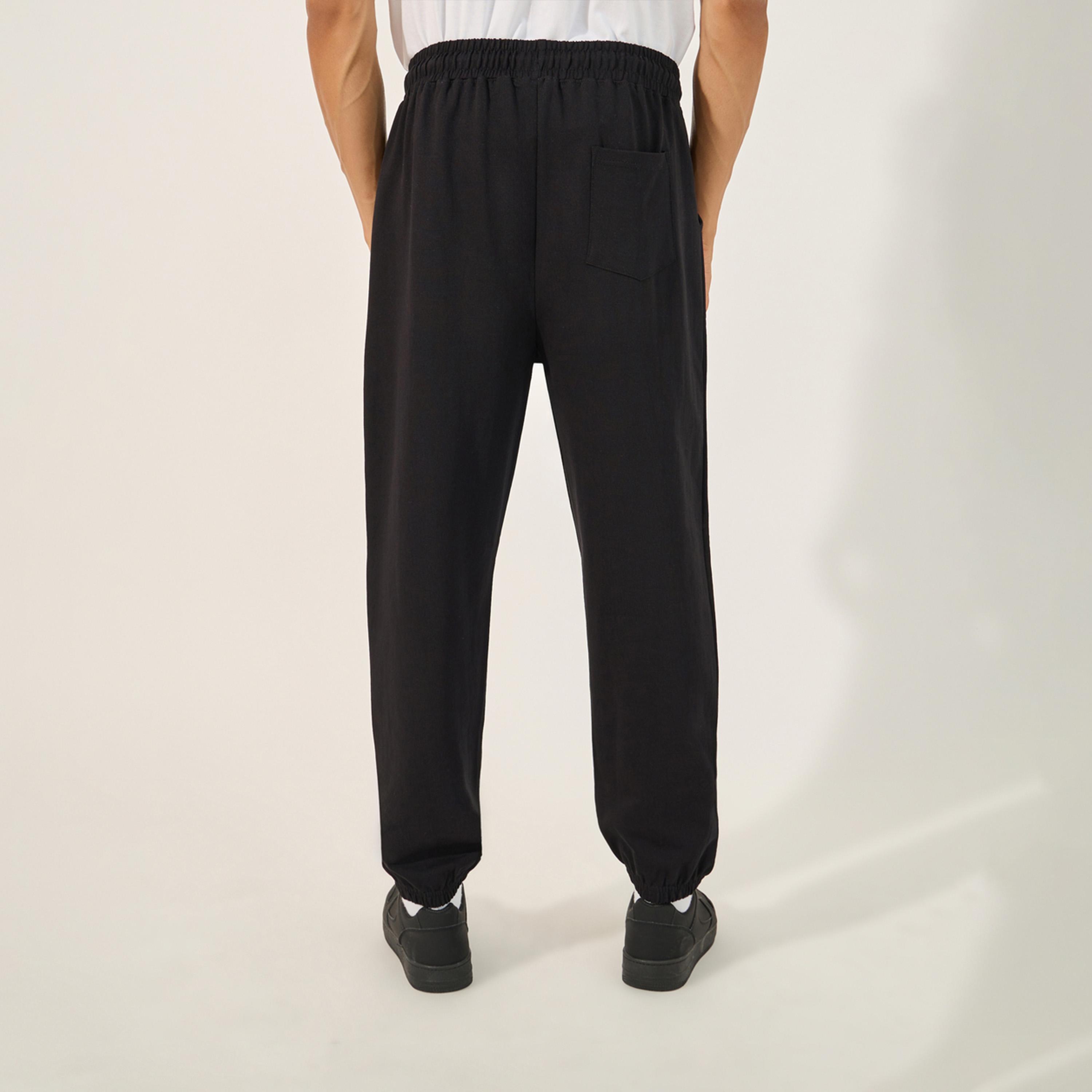 Styli Minimal Slogan Print Oversized Jogger with Drawstring-men-clothing-bottoms-joggers-image-4