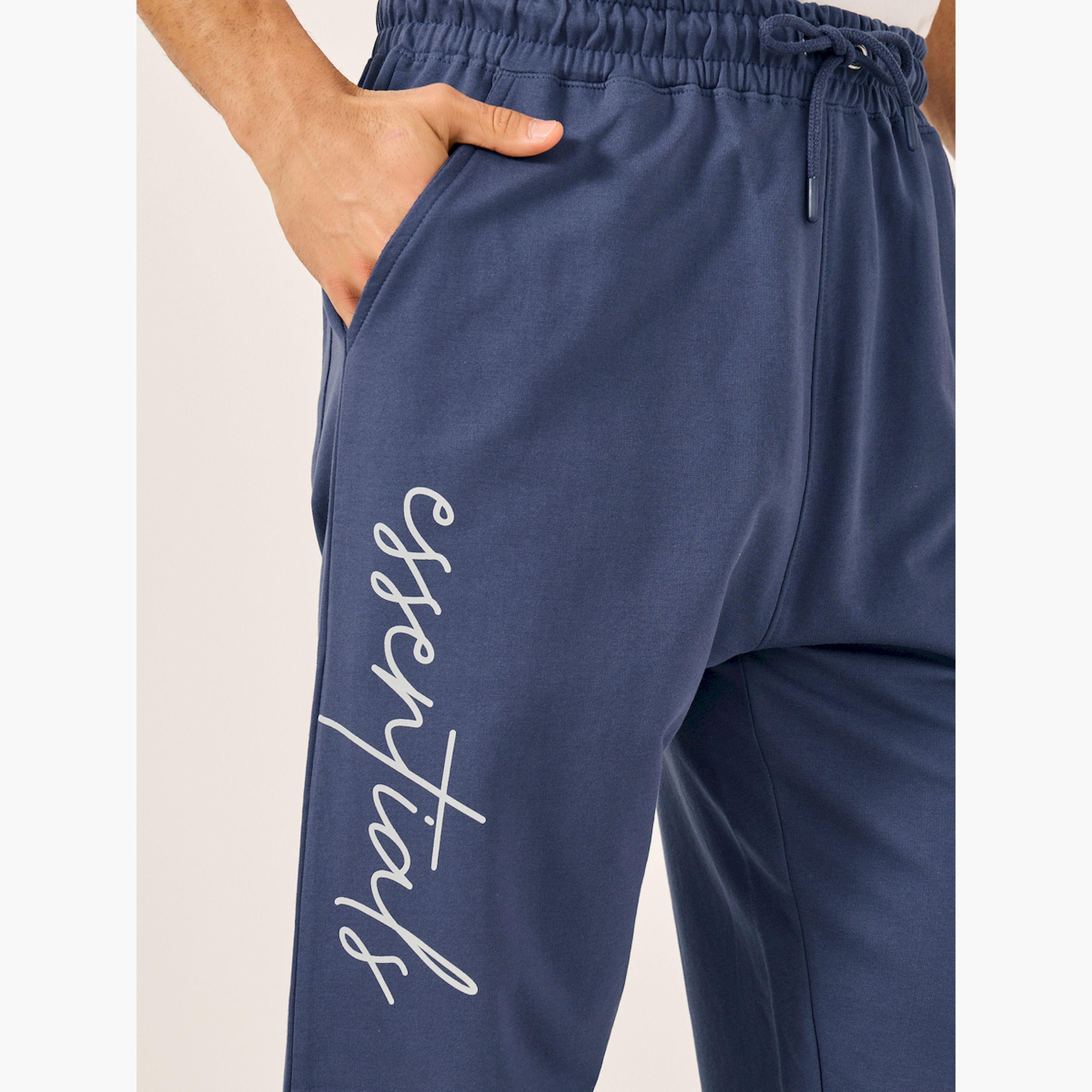 ستايلي -  بنطال رياضي قطني تيري بقصة واسعة وطبعة شعار-men-clothing-bottoms-joggers-image-3