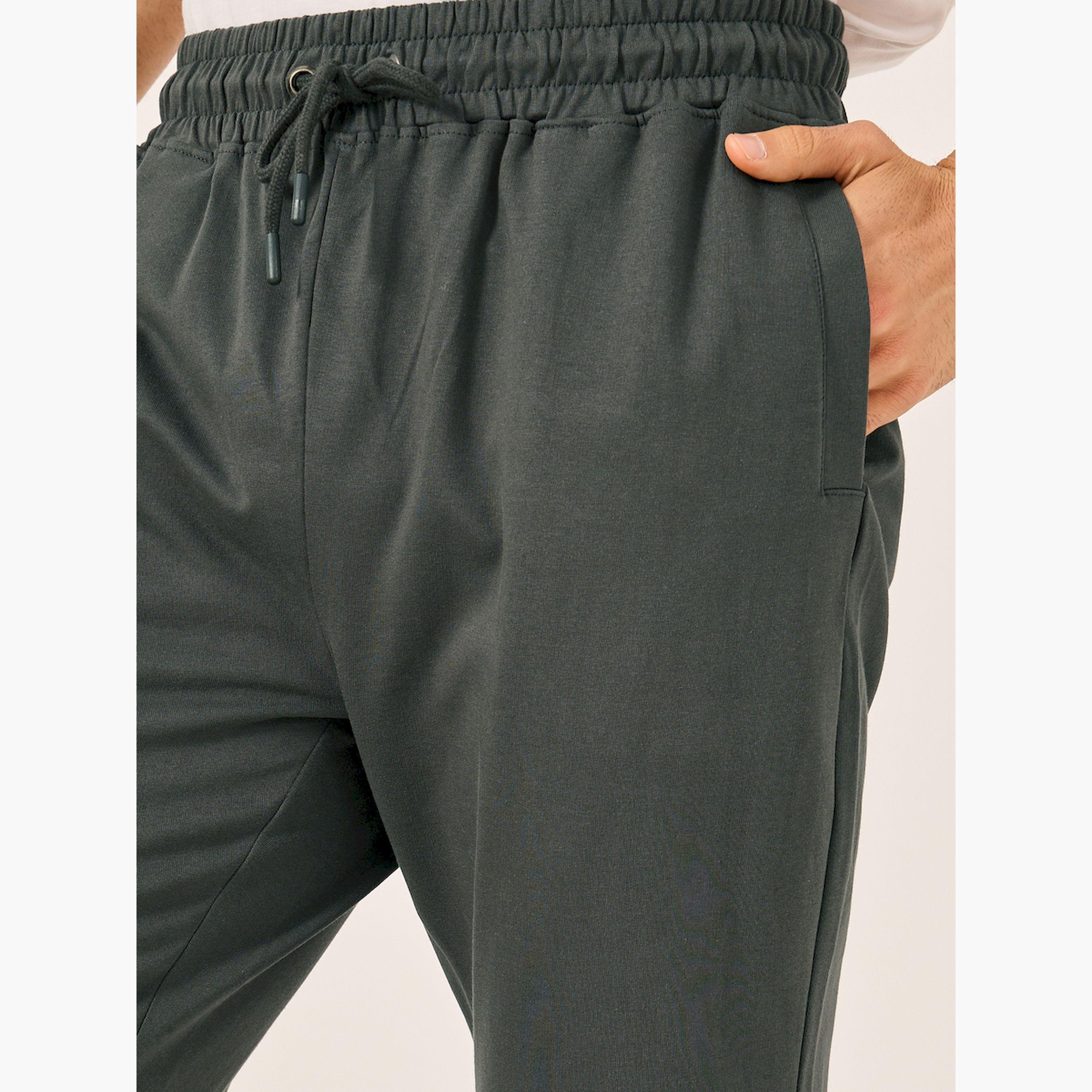 ستايلي - بنطال رياضي بخصر متوسط الارتفاع وقصة ضيقة وأساور مضلعة-men-clothing-bottoms-joggers-image-3