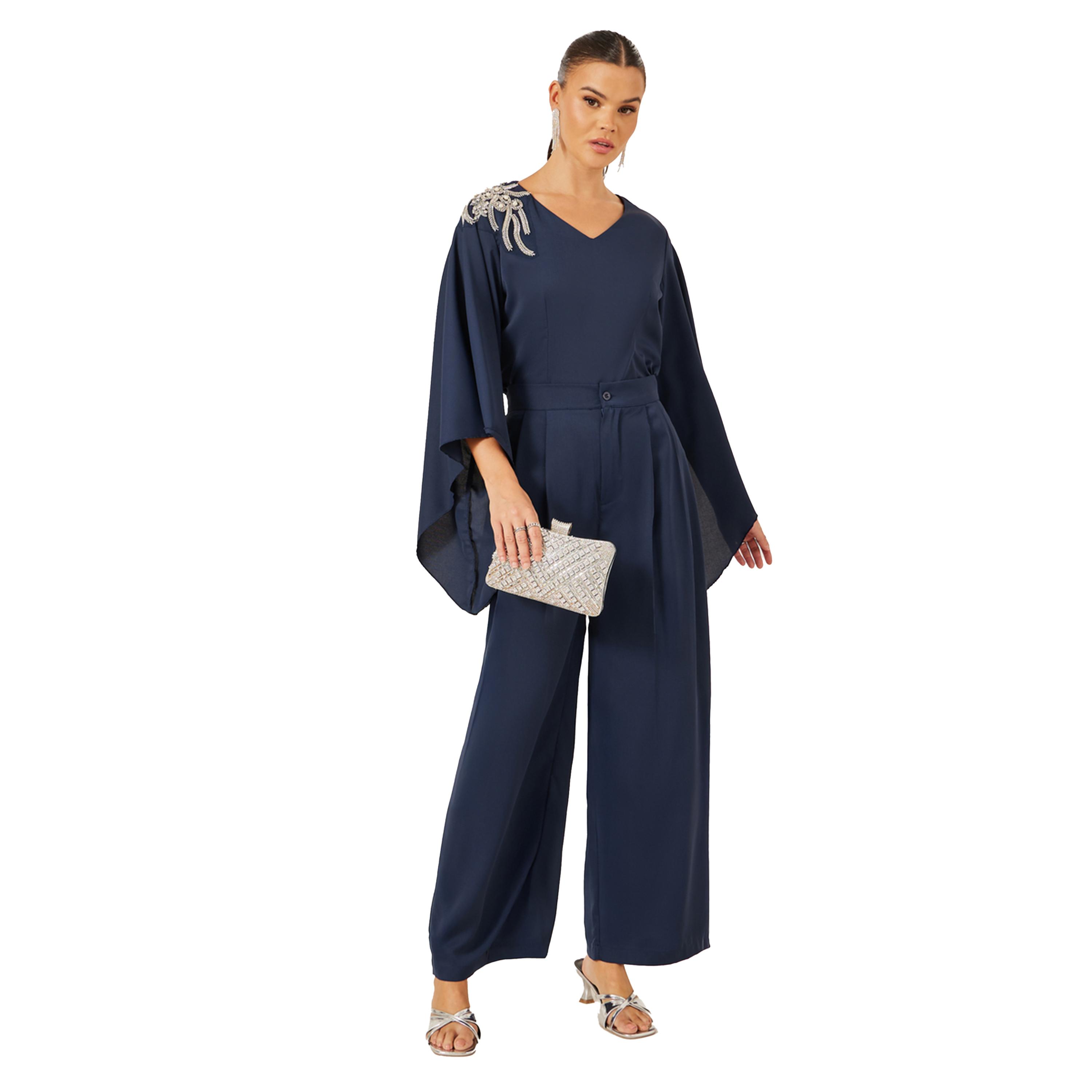 ستايلي - طقم من بلوزة مزينة بياقة V وبنطال واسع الساق-women-clothing-coordsets-image-1