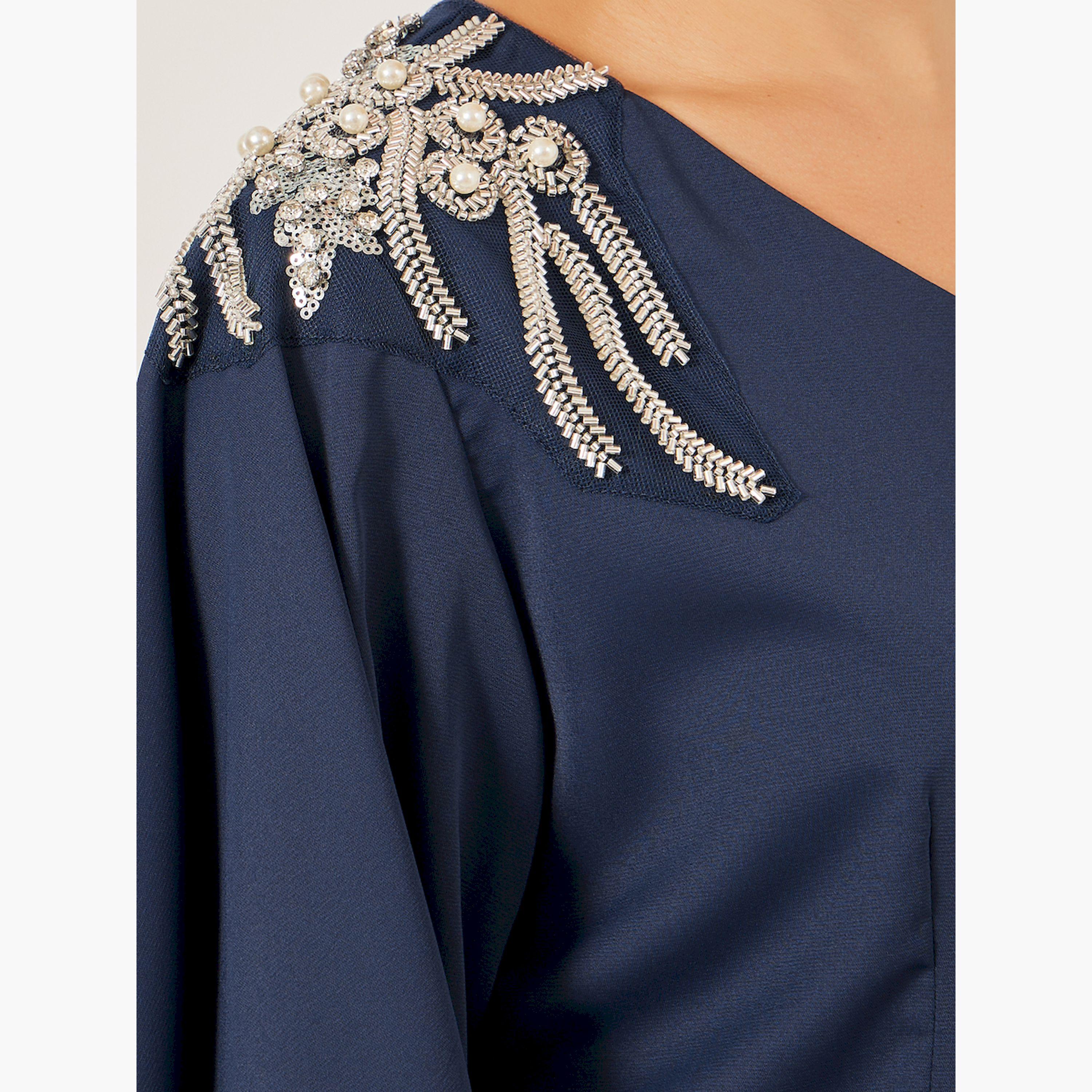 ستايلي - طقم من بلوزة مزينة بياقة V وبنطال واسع الساق-women-clothing-coordsets-image-3