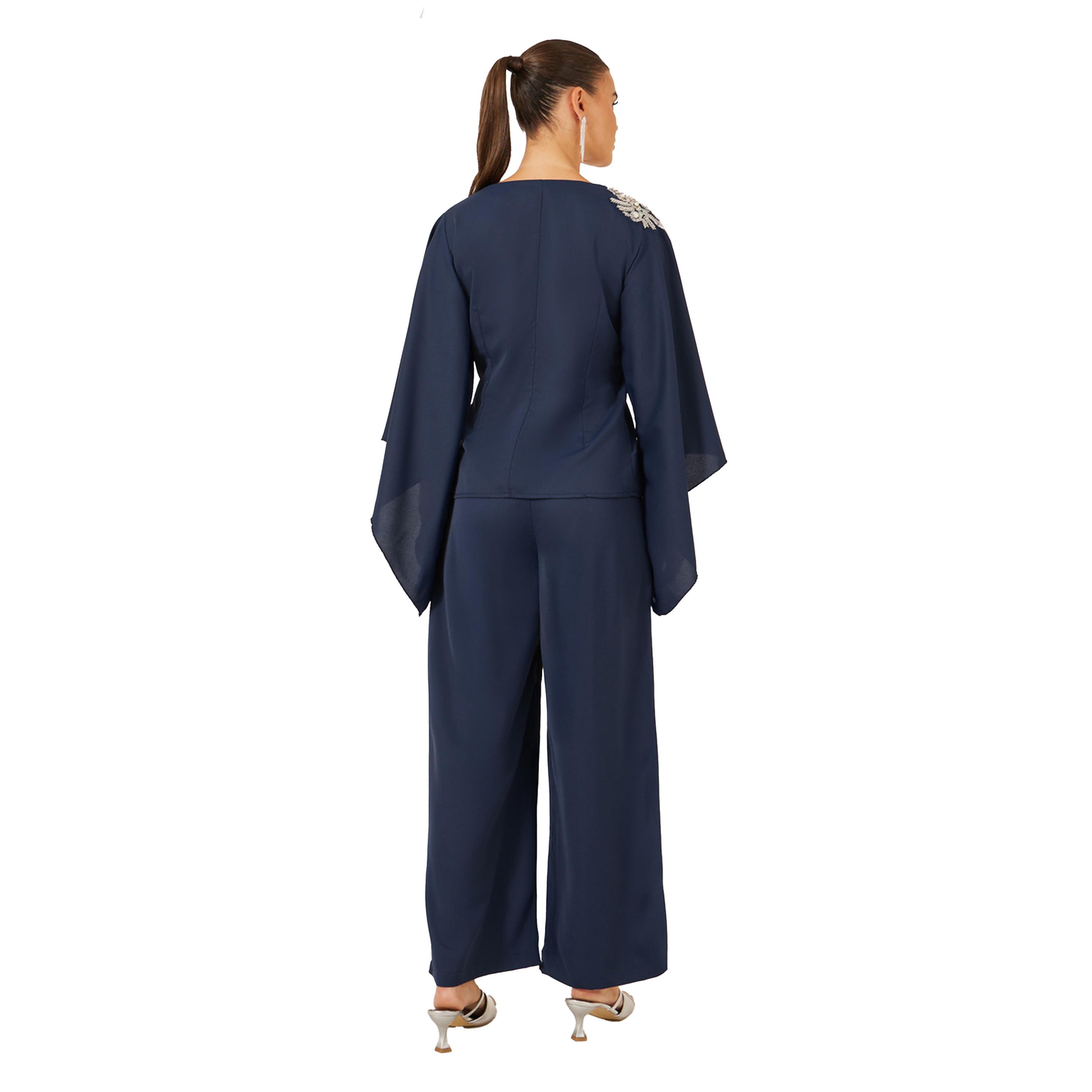 ستايلي - طقم من بلوزة مزينة بياقة V وبنطال واسع الساق-women-clothing-coordsets-image-4