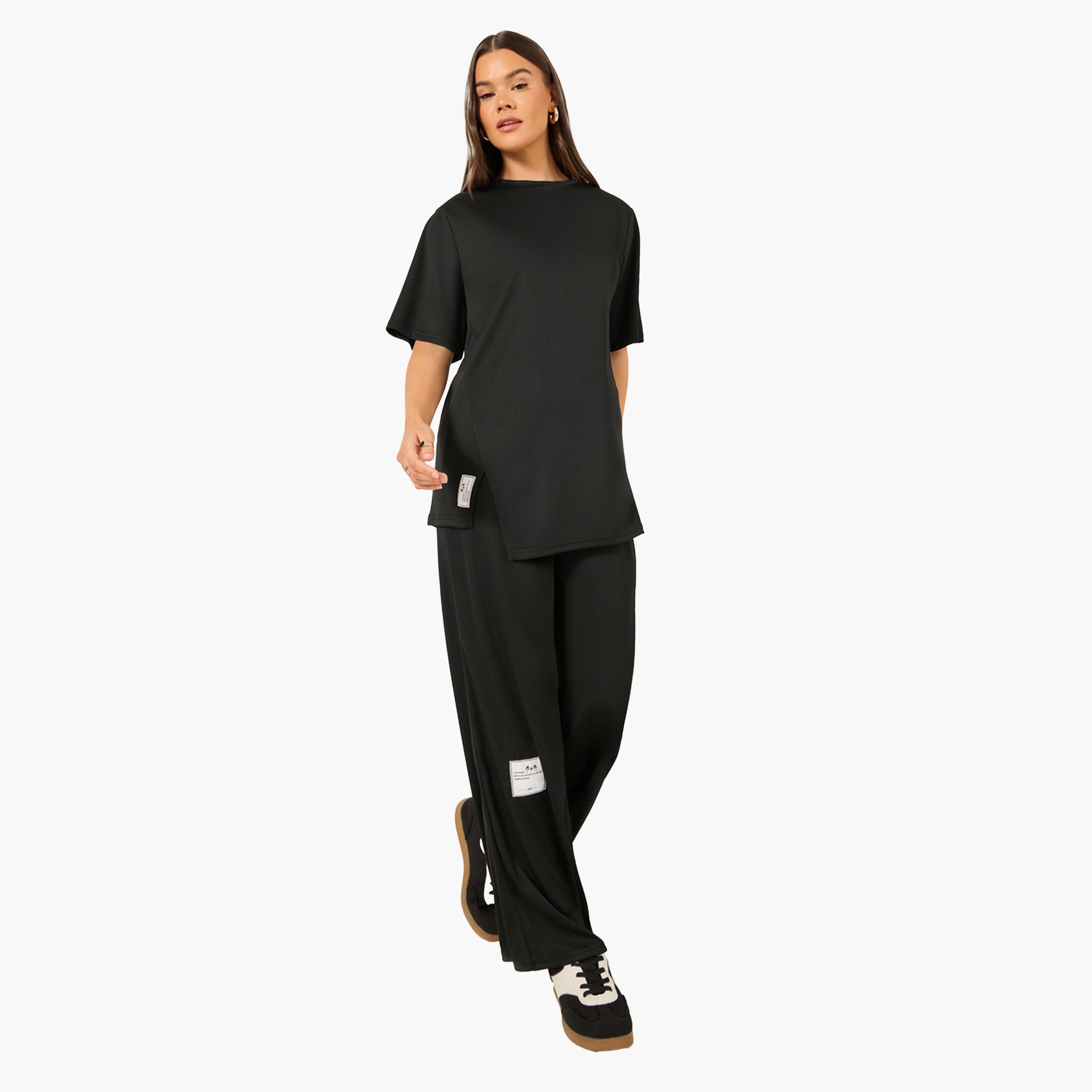 ستايلي - طقم قميص سادة كبير الحجم مع بنطال رياضي واسع الساق-women-clothing-coordsets-image-2