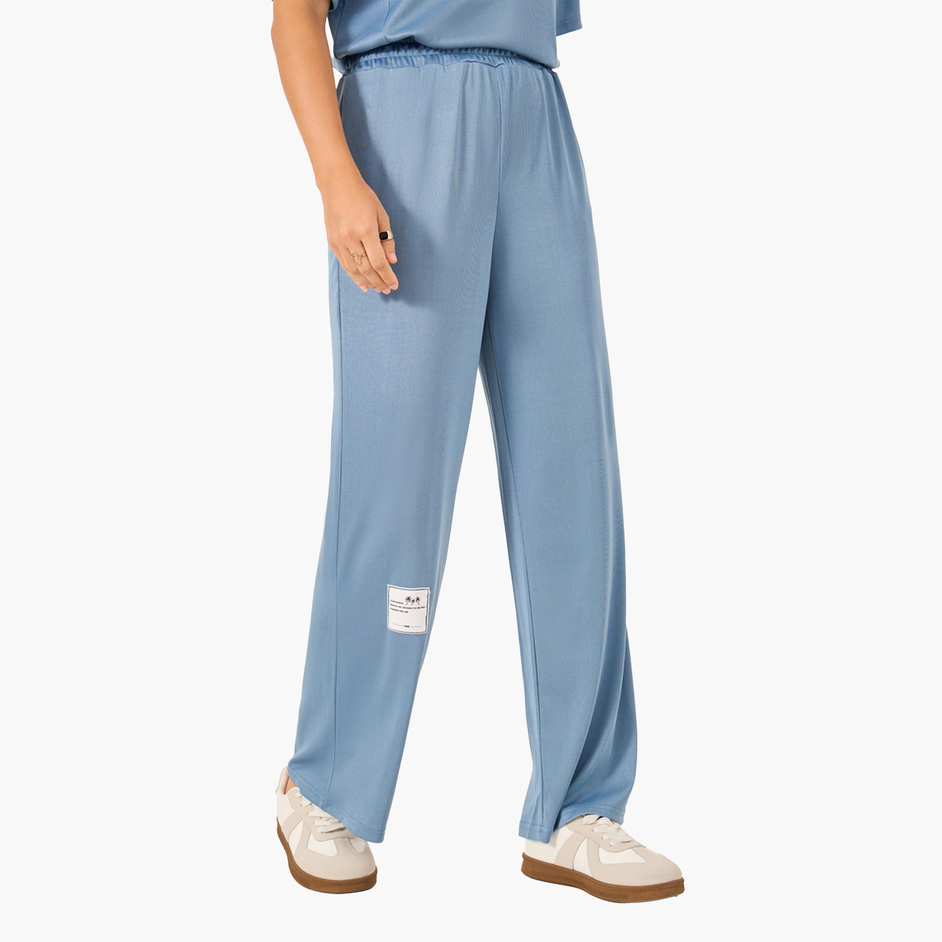 ستايلي - طقم قميص سادة كبير الحجم مع بنطال رياضي واسع الساق-women-clothing-coordsets-image-4