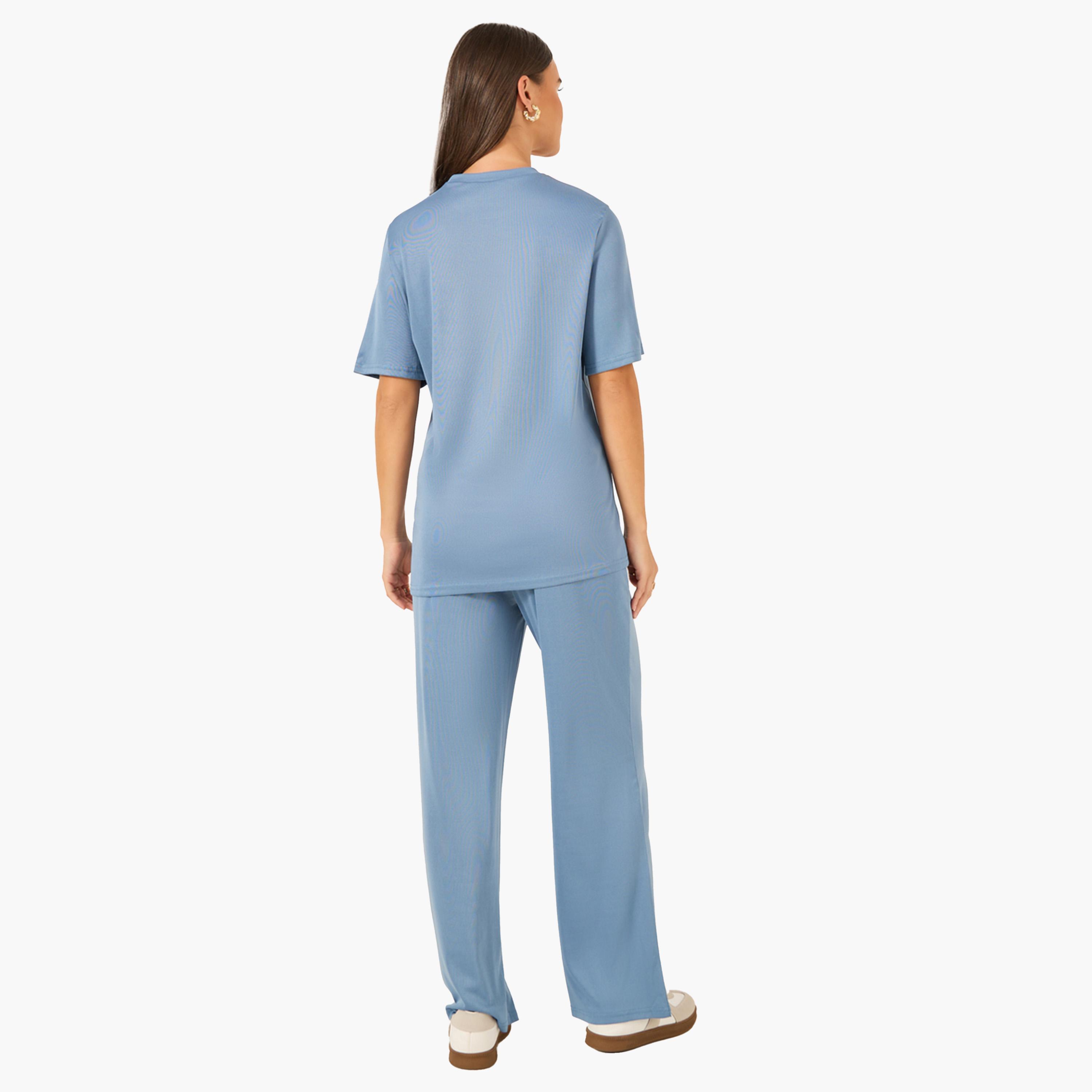 ستايلي - طقم قميص سادة كبير الحجم مع بنطال رياضي واسع الساق-women-clothing-coordsets-image-5