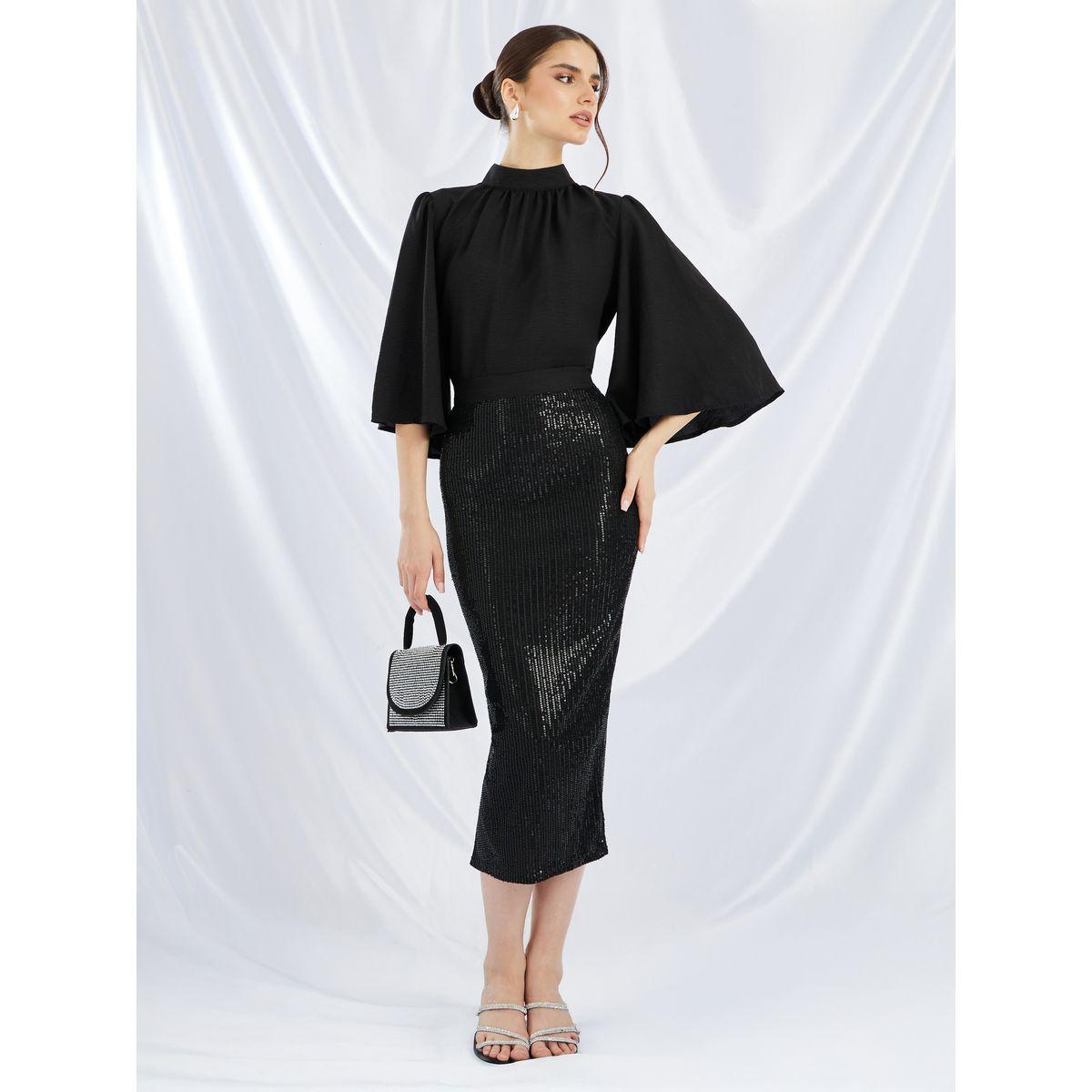 طقم منسق من تنورة منمقة بالترتر مع بلوزة سادة بياقة عالية-women-clothing-coordsets-image-1