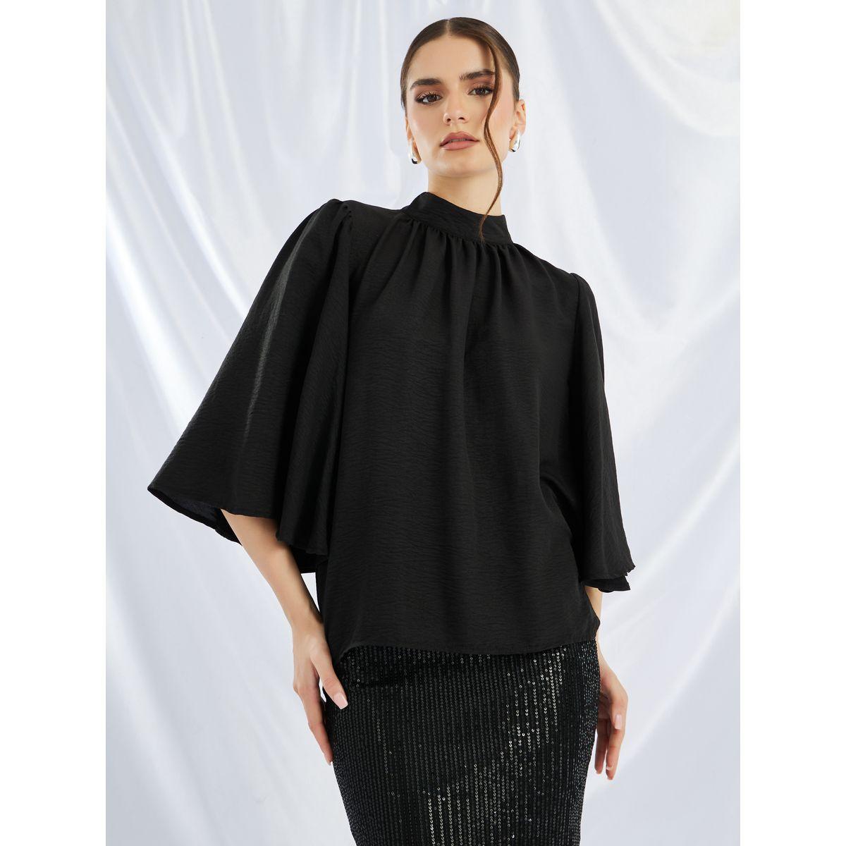 طقم منسق من تنورة منمقة بالترتر مع بلوزة سادة بياقة عالية-women-clothing-coordsets-image-2