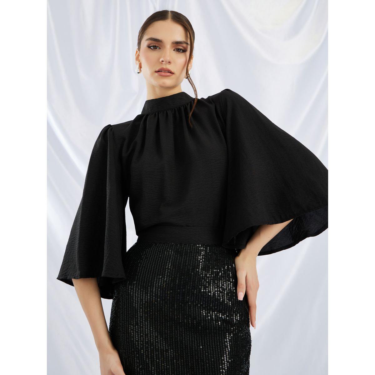 طقم منسق من تنورة منمقة بالترتر مع بلوزة سادة بياقة عالية-women-clothing-coordsets-image-4