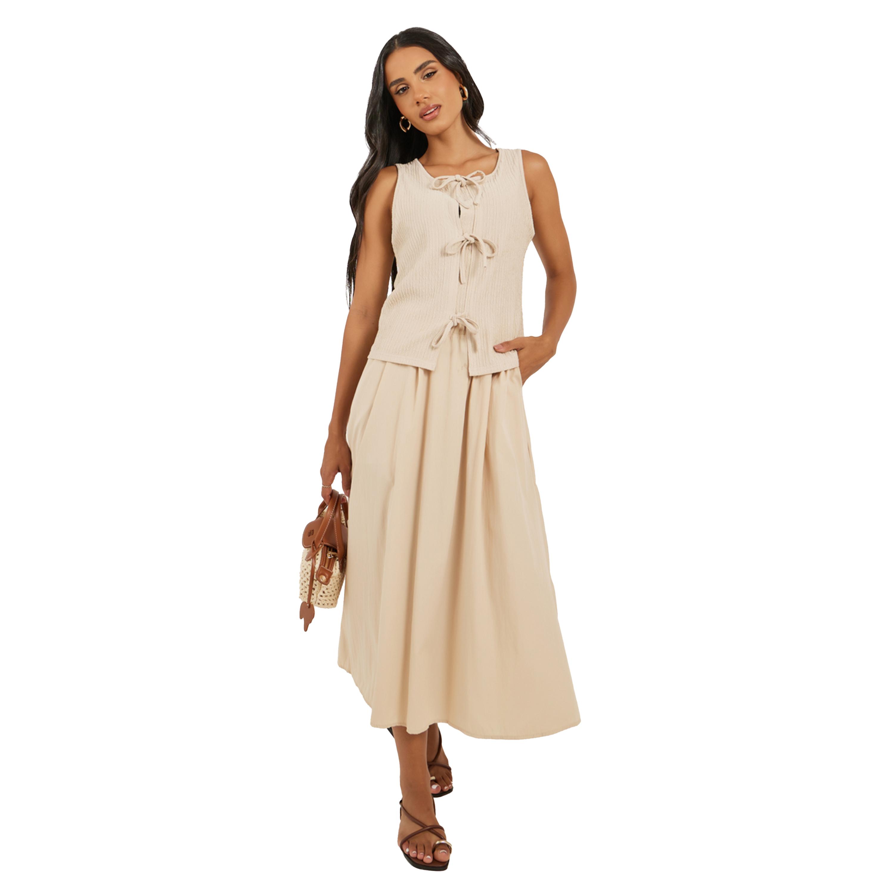 ستايلي -  بلوزة نسائية محبوكة بدون أكمام برباط أمامي مضلع باللون البيج-women-clothing-tshirts-image-2
