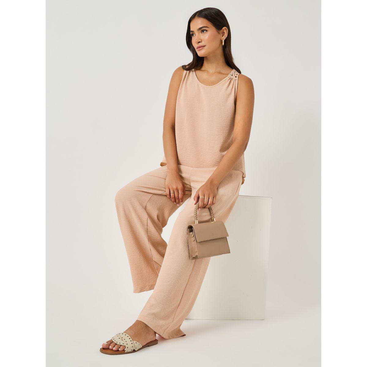 طقم منسق من بنطال وبلوزة سادة بلا أكمام-women-clothing-coordsets-image-1