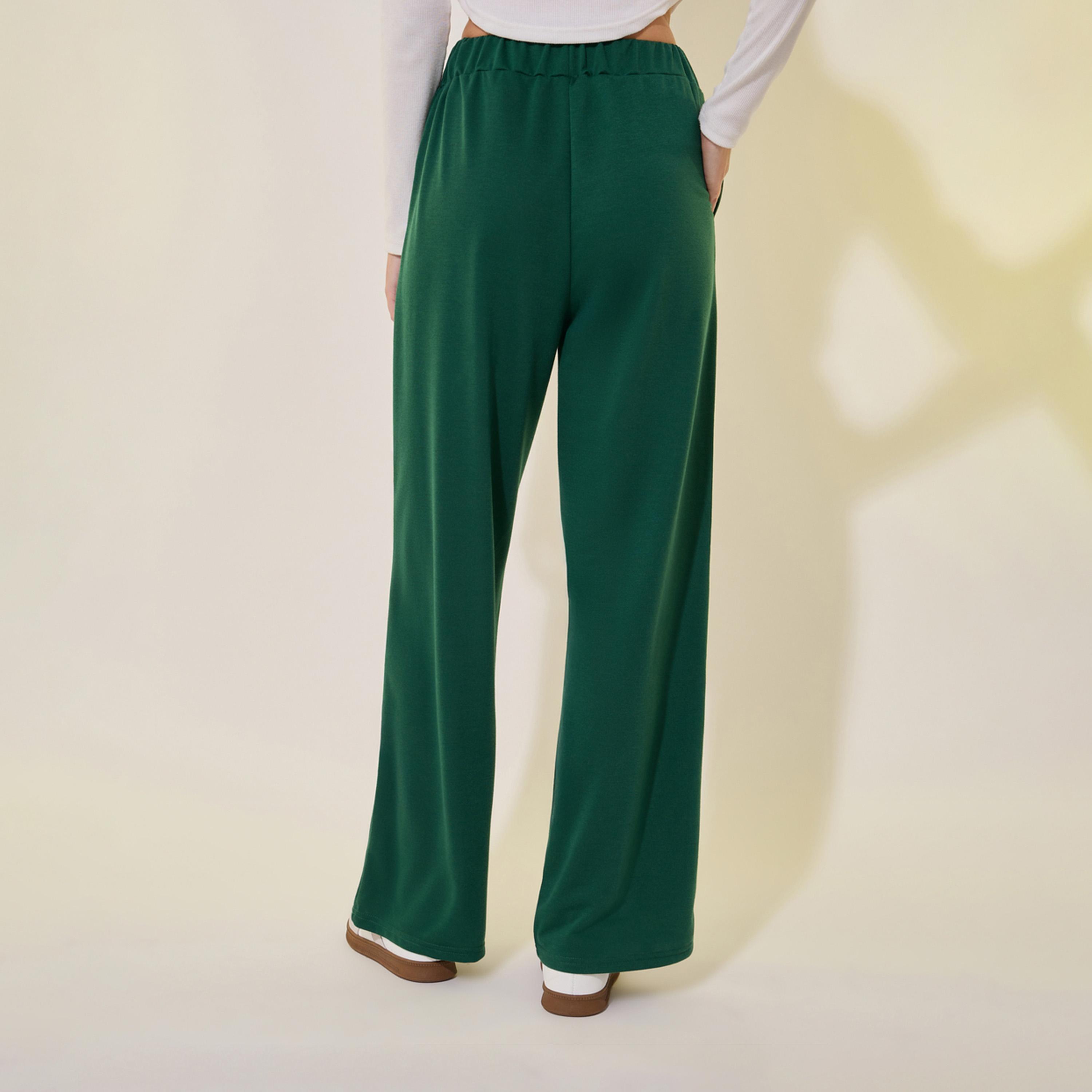 بنطال سادة بخصر متوسط وقصة أرجل واسعة-women-clothing-bottoms-trousers-image-4