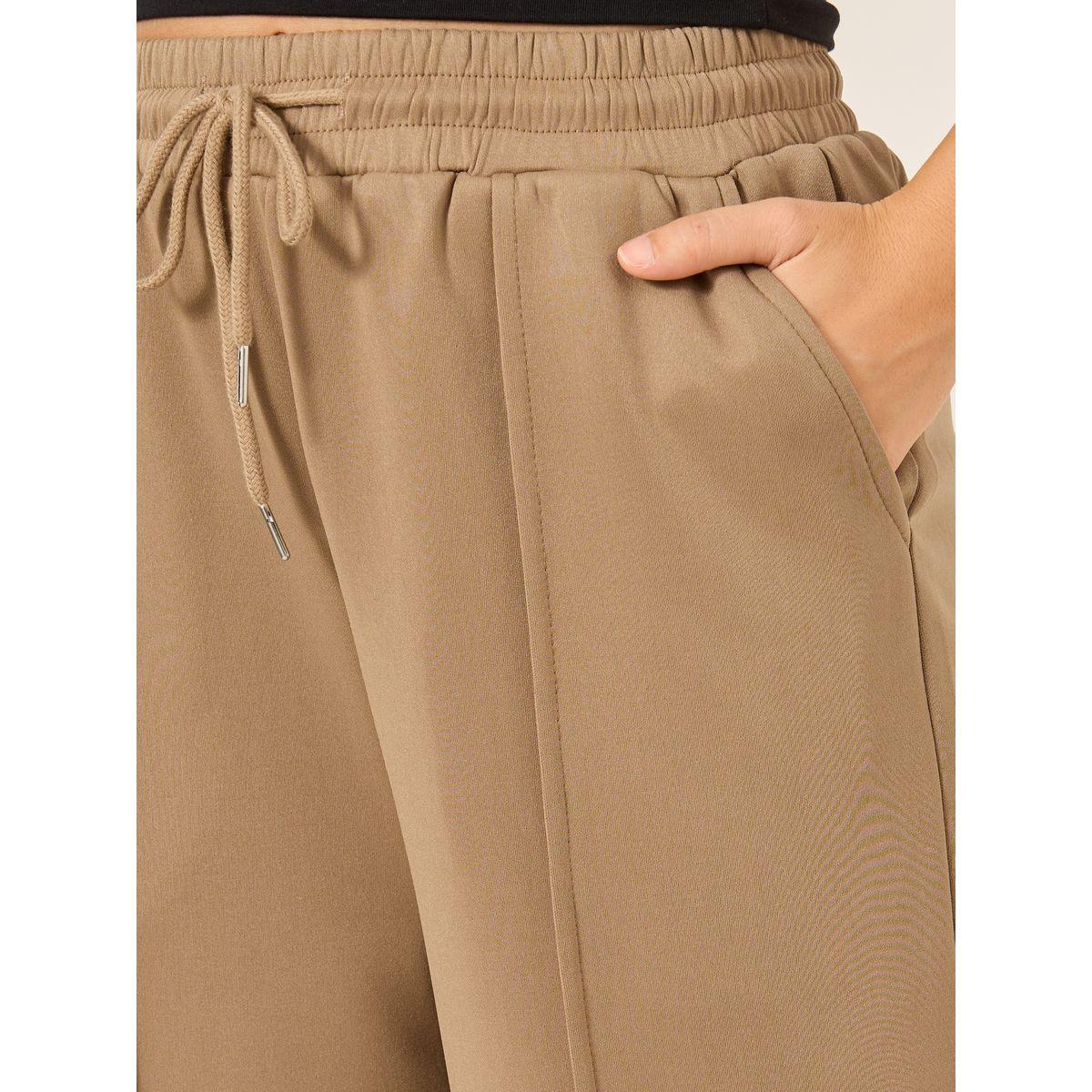 جوغر سادة بتفاصيل محزوزة وخصر مطاطي-women-clothing-bottoms-joggers-image-3