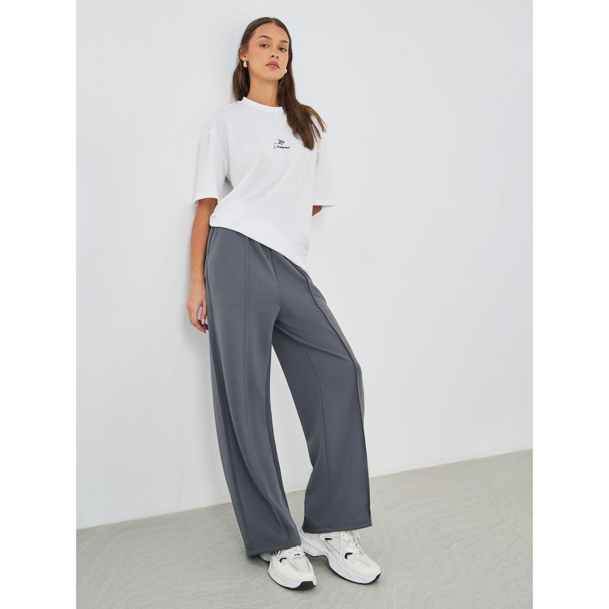 جوغر سادة بتفاصيل محزوزة وخصر مطاطي-women-clothing-bottoms-joggers-image-1