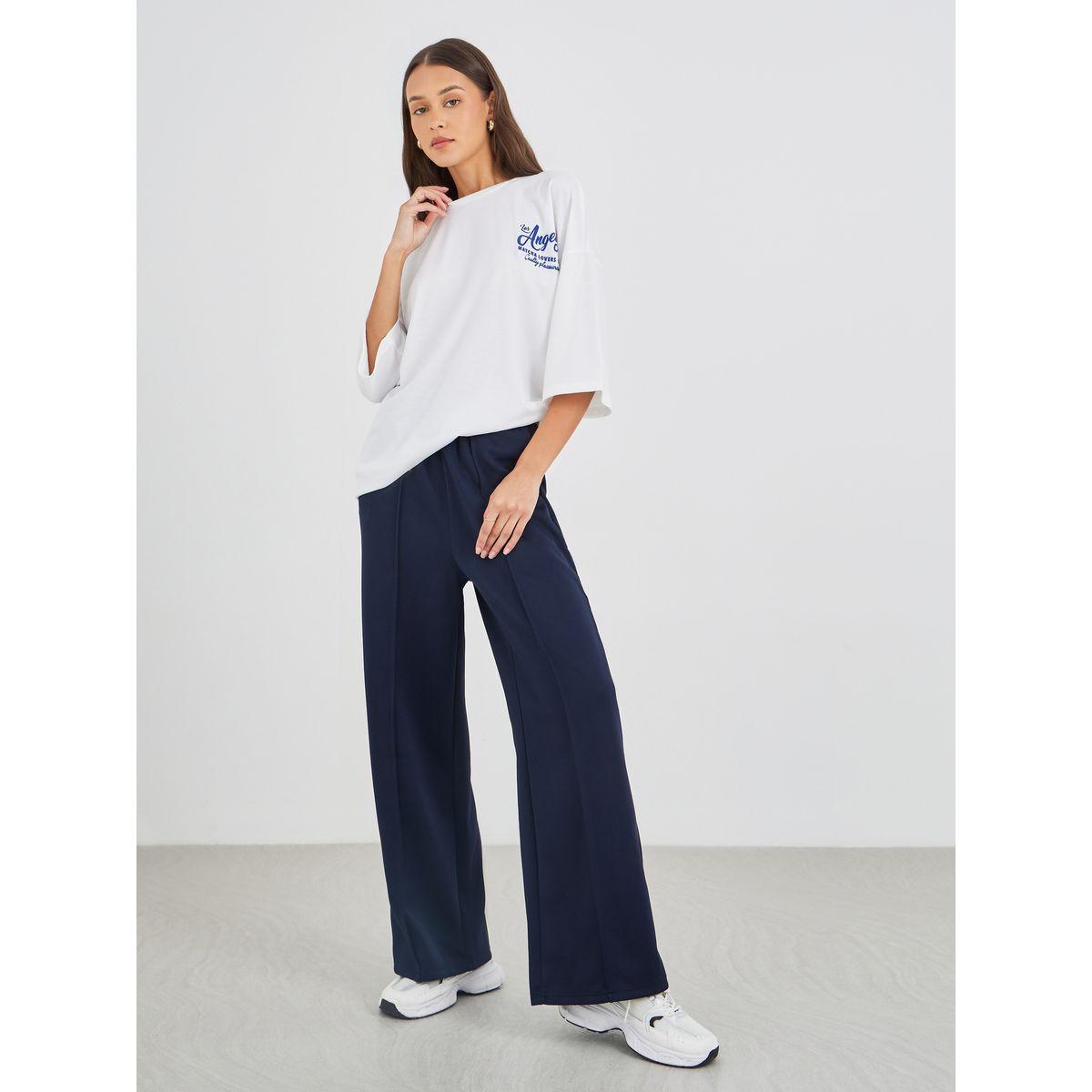 جوغر سادة بتفاصيل محزوزة وخصر مطاطي-women-clothing-bottoms-joggers-image-1