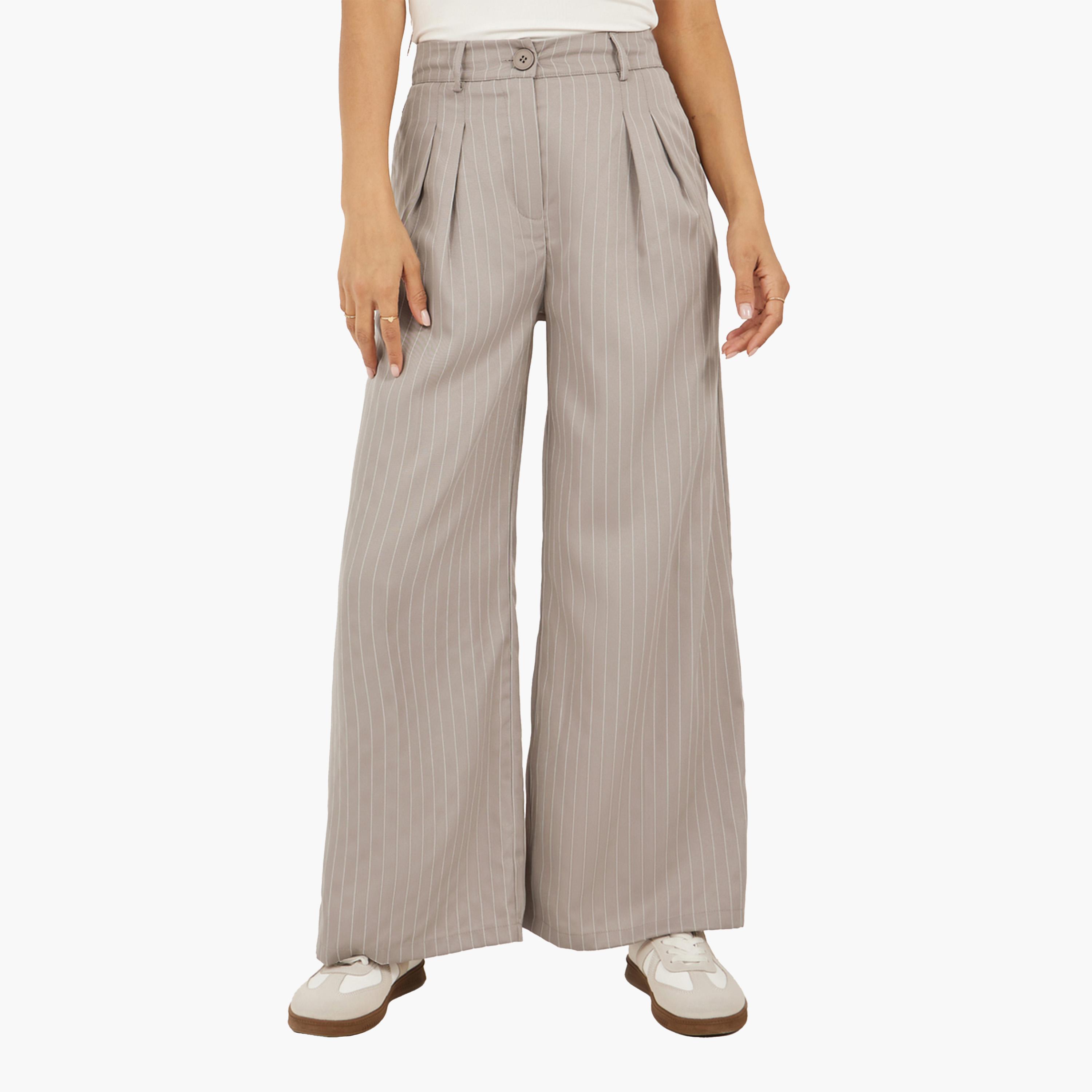 ستايلي-  بنطلون مخطط باللون البيج-women-clothing-bottoms-trousers-image-1