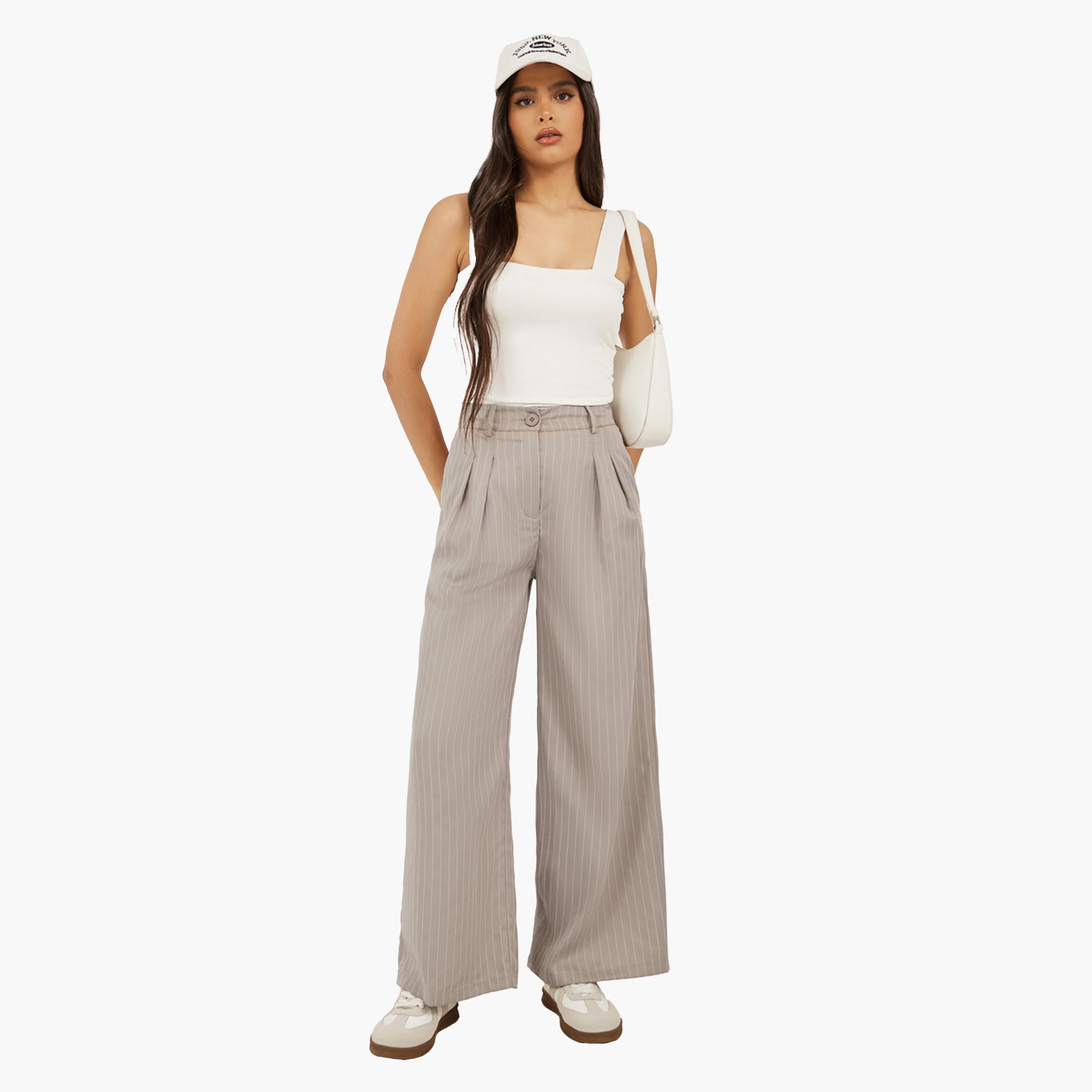 ستايلي-  بنطلون مخطط باللون البيج-women-clothing-bottoms-trousers-image-2