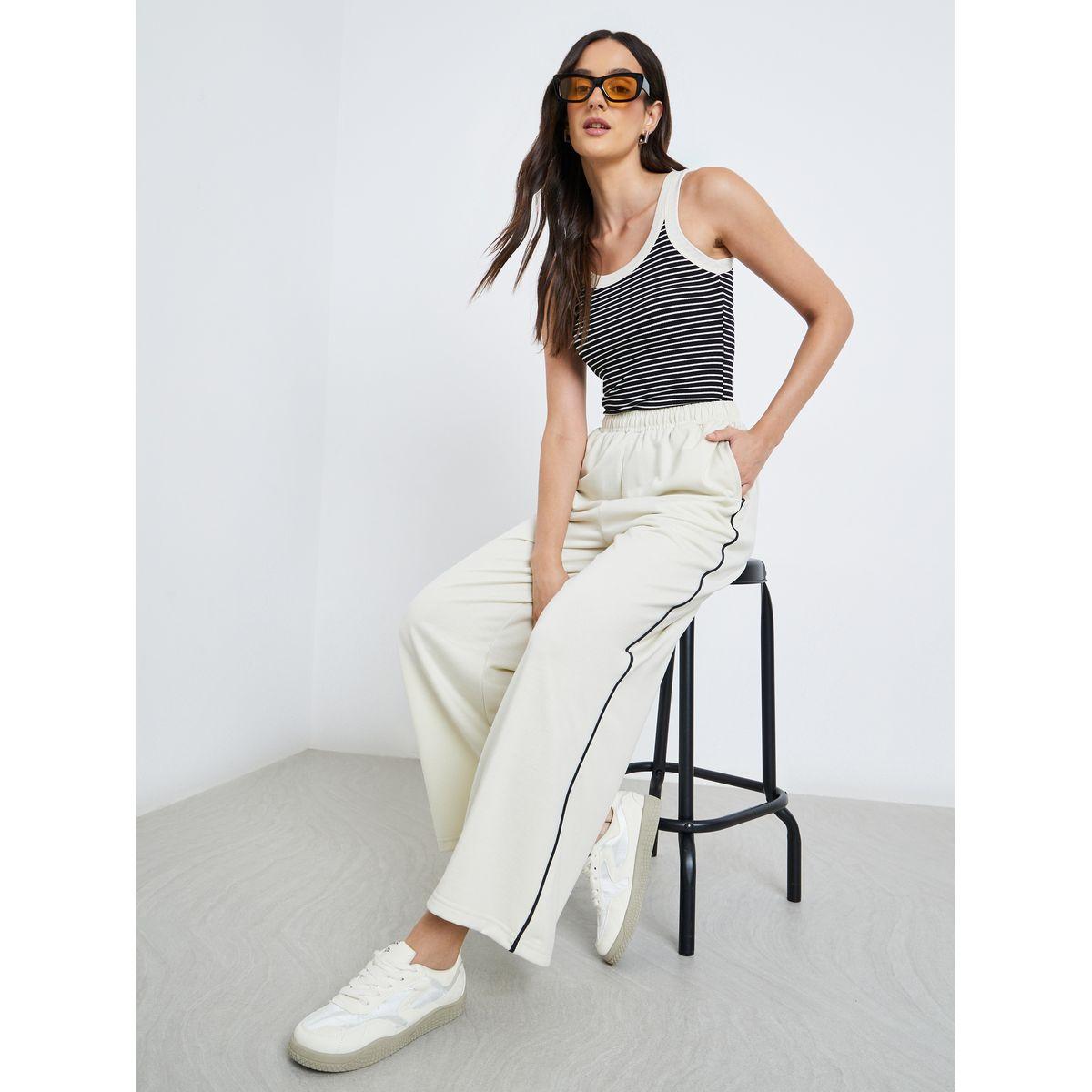 Styli Women Off White Wide Leg Joggers with Contrast Piping Detail-women-clothing-bottoms-joggers-image-1