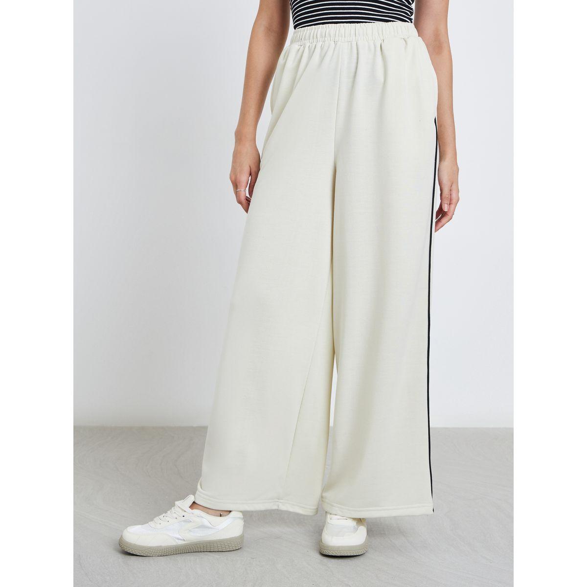 Styli Women Off White Wide Leg Joggers with Contrast Piping Detail-women-clothing-bottoms-joggers-image-3