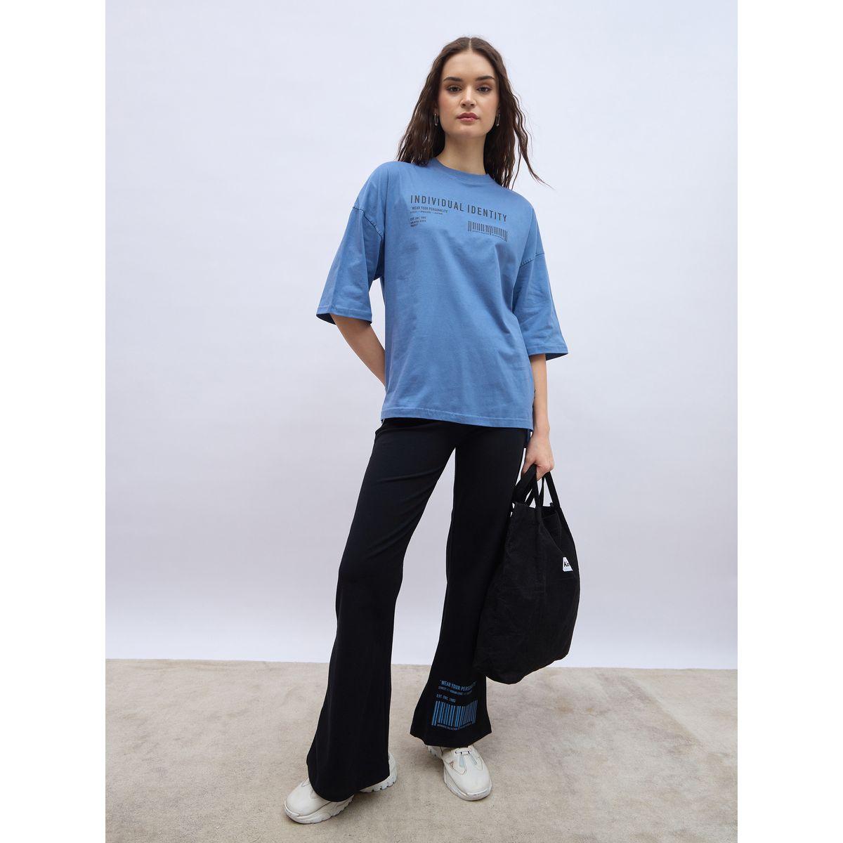 Styli Slogan Print Oversized T-Shirt and Flared Leggings Co-Ords-women-clothing-coordsets-image-1
