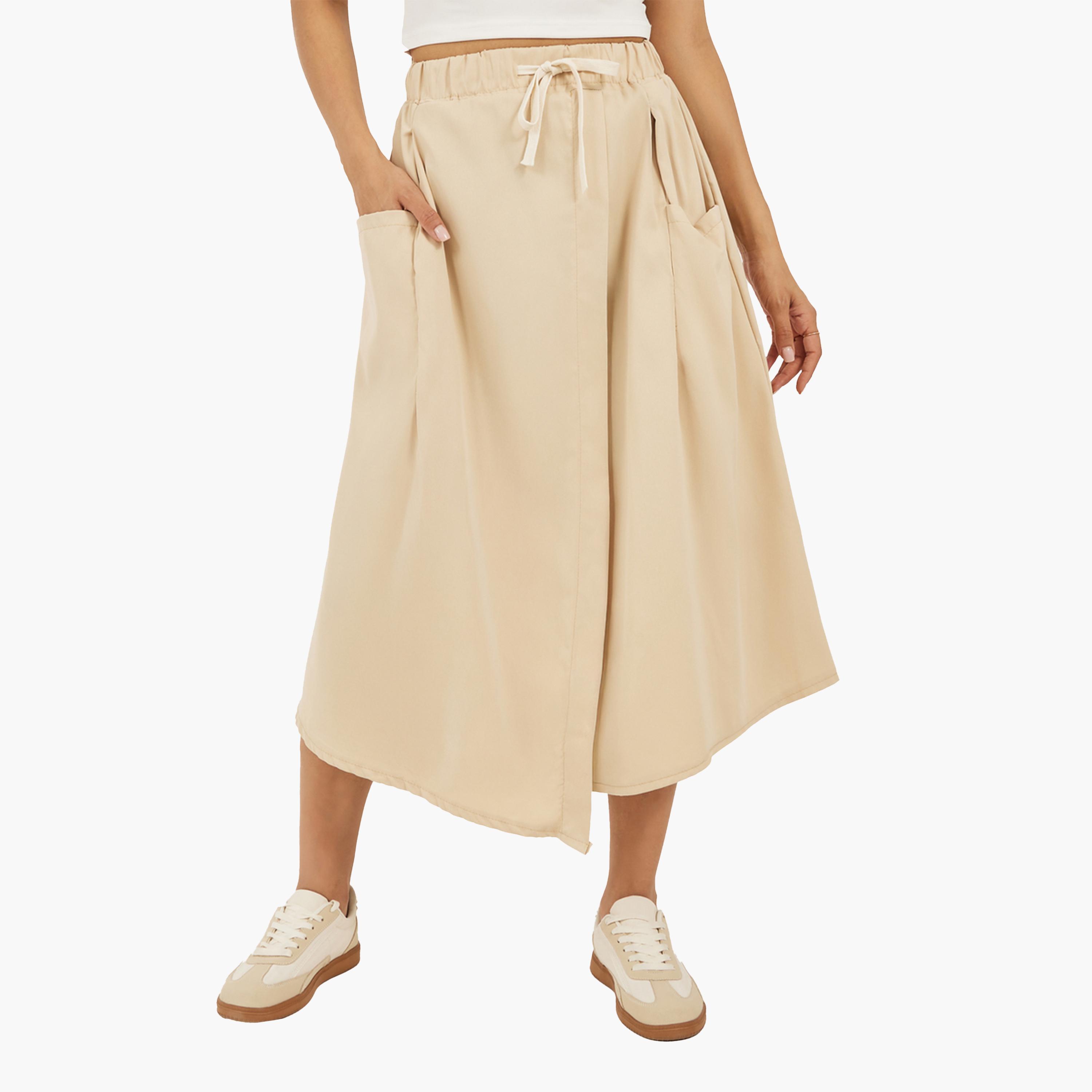 ستايلي - تنورة ميدي سادة بقصة A مع خصر برباط وجيوب-women-clothing-bottoms-skirts-image-1