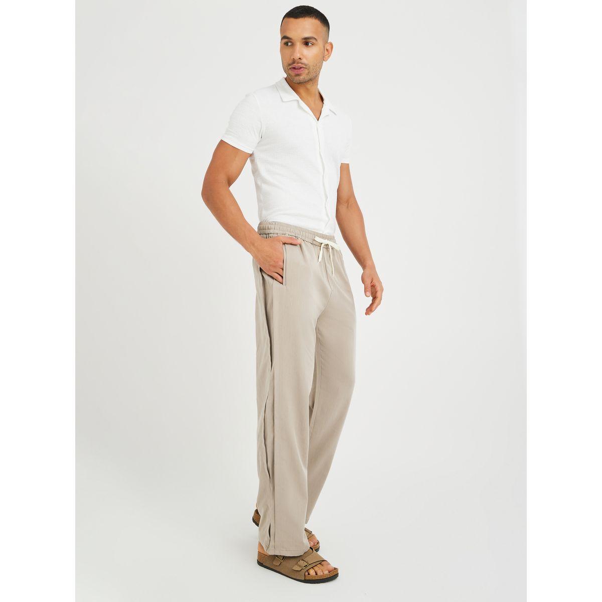 بنطال رياضي سادة بقصة مريحة وجيب مائل-men-clothing-bottoms-joggers-image-3