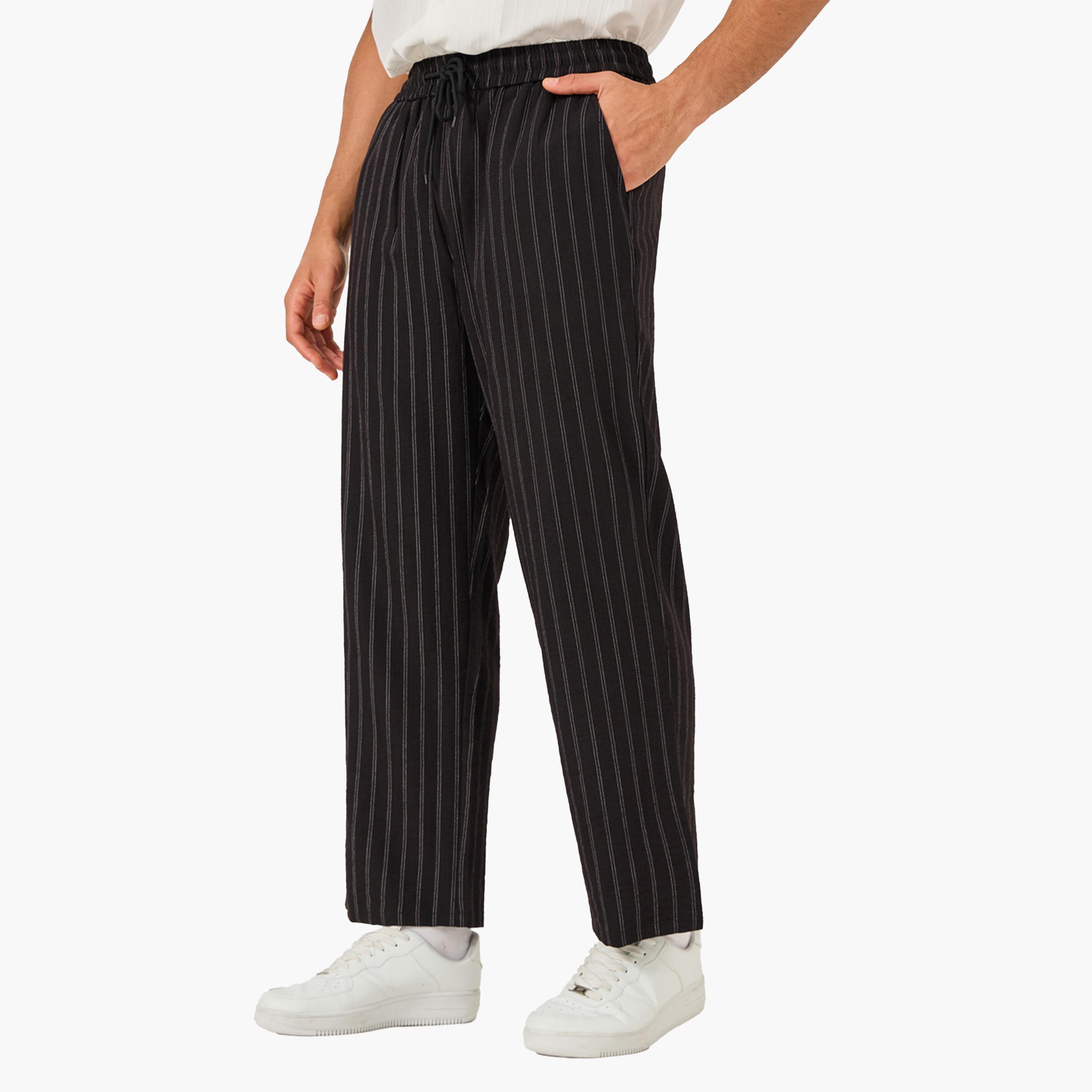 ستايلي - بنطال مخطط واسع الساق بخصر متوسط الارتفاع مع جيوب-men-clothing-bottoms-trousersandchinos-trousers-image-1