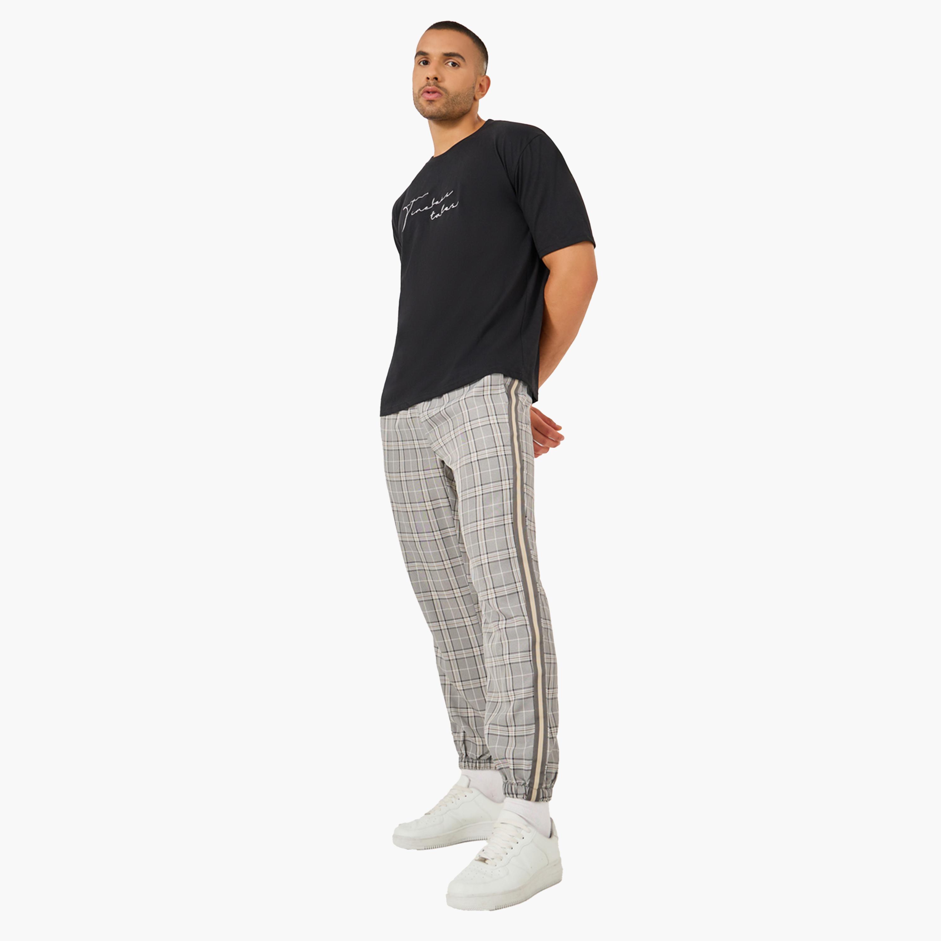 ستايلي - بنطال رياضي مربعات بقصة ضيقة ورباط-men-clothing-bottoms-joggers-image-2