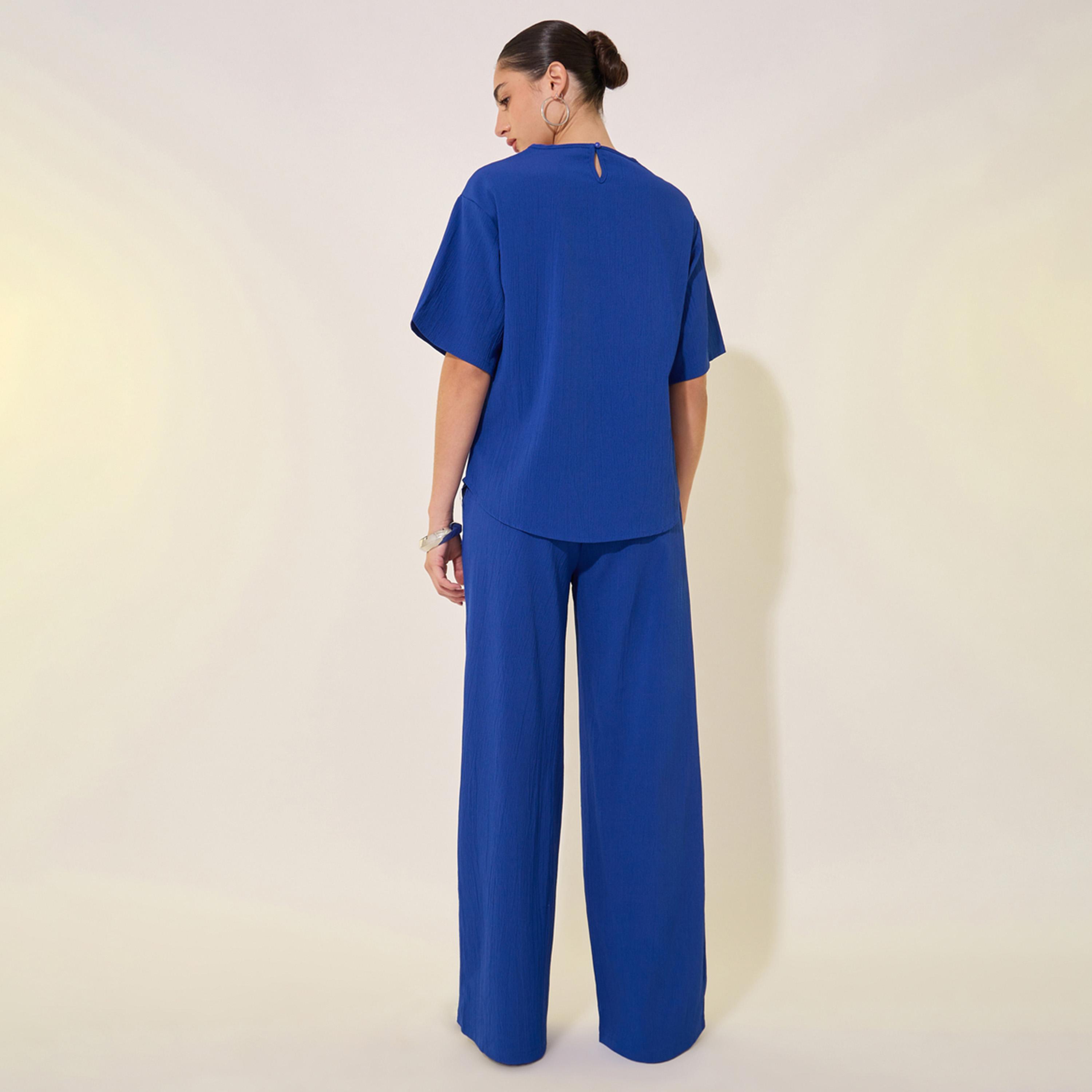 ستايلي - طقم تي شيرت مع بنطال سادة كبير الحجم برقبة دائرية-women-clothing-coordsets-image-4