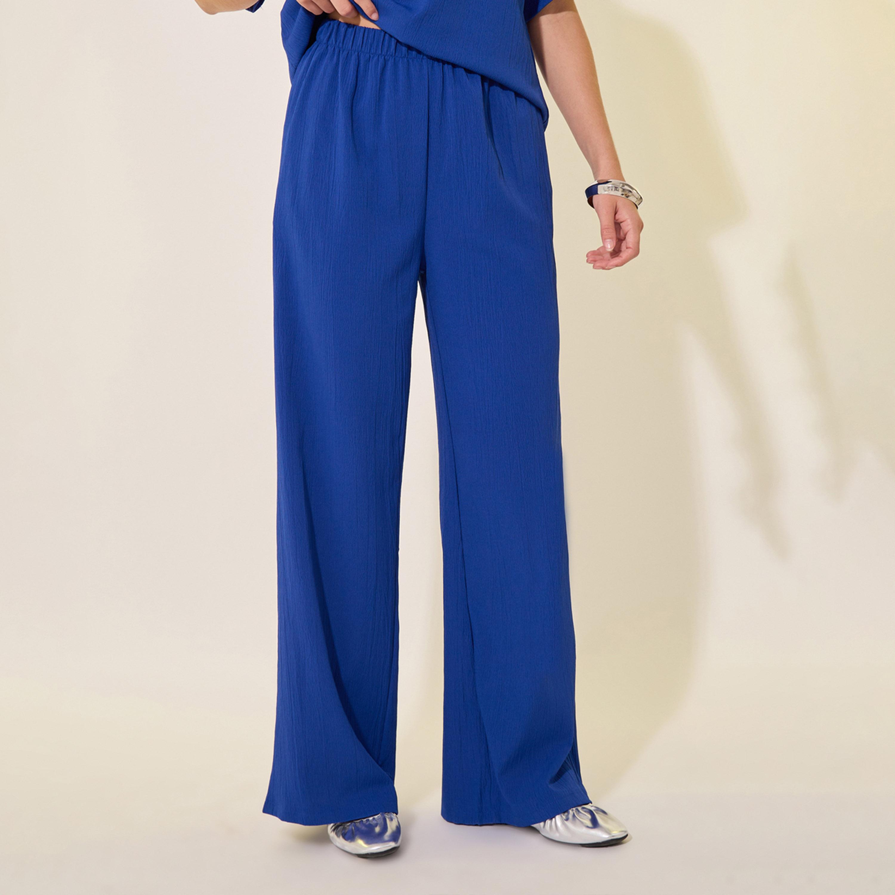 ستايلي - طقم تي شيرت مع بنطال سادة كبير الحجم برقبة دائرية-women-clothing-coordsets-image-5