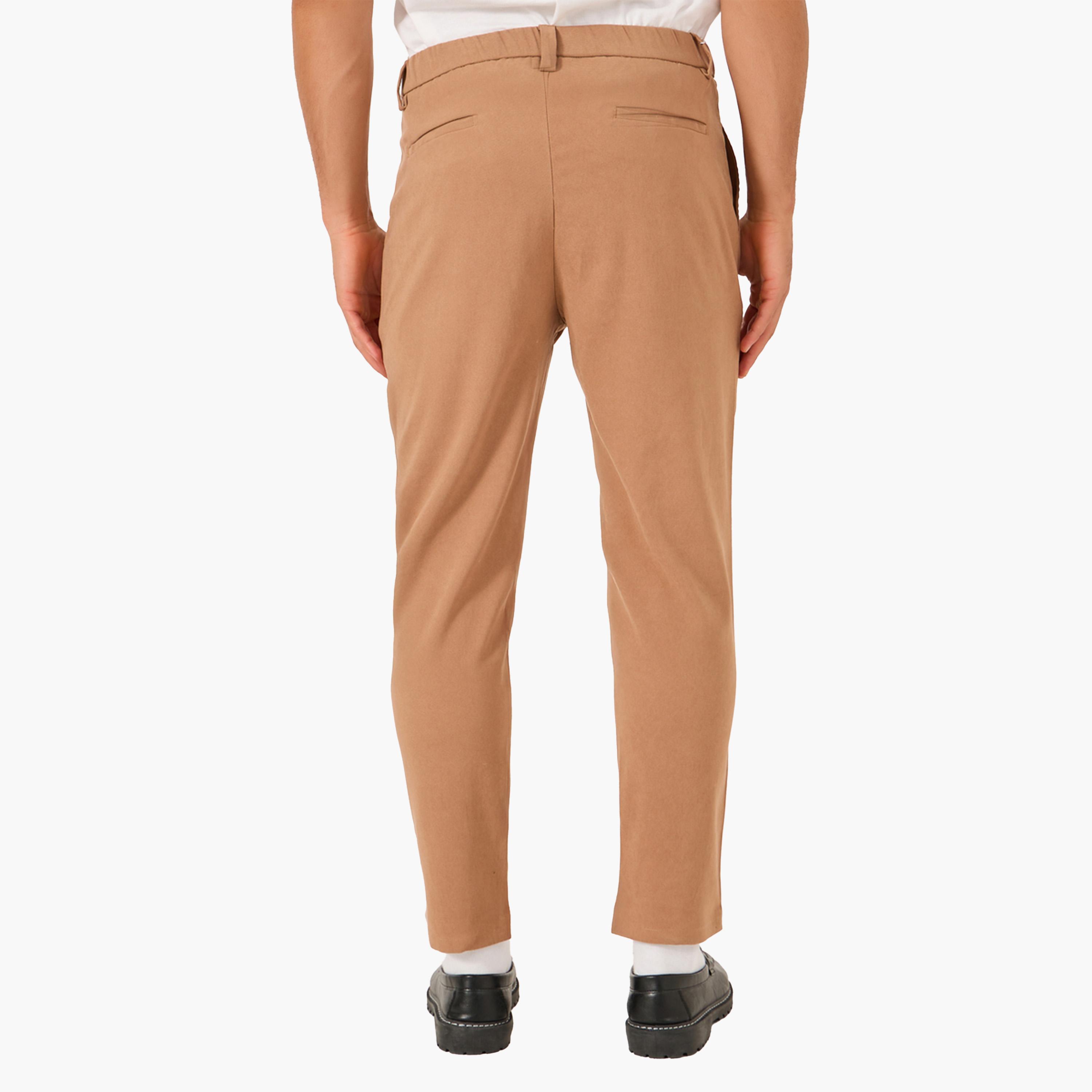 ستايلي - بنطال سادة مائل بجيوب مائلة وقصّة مريحة-men-clothing-bottoms-trousersandchinos-trousers-image-4