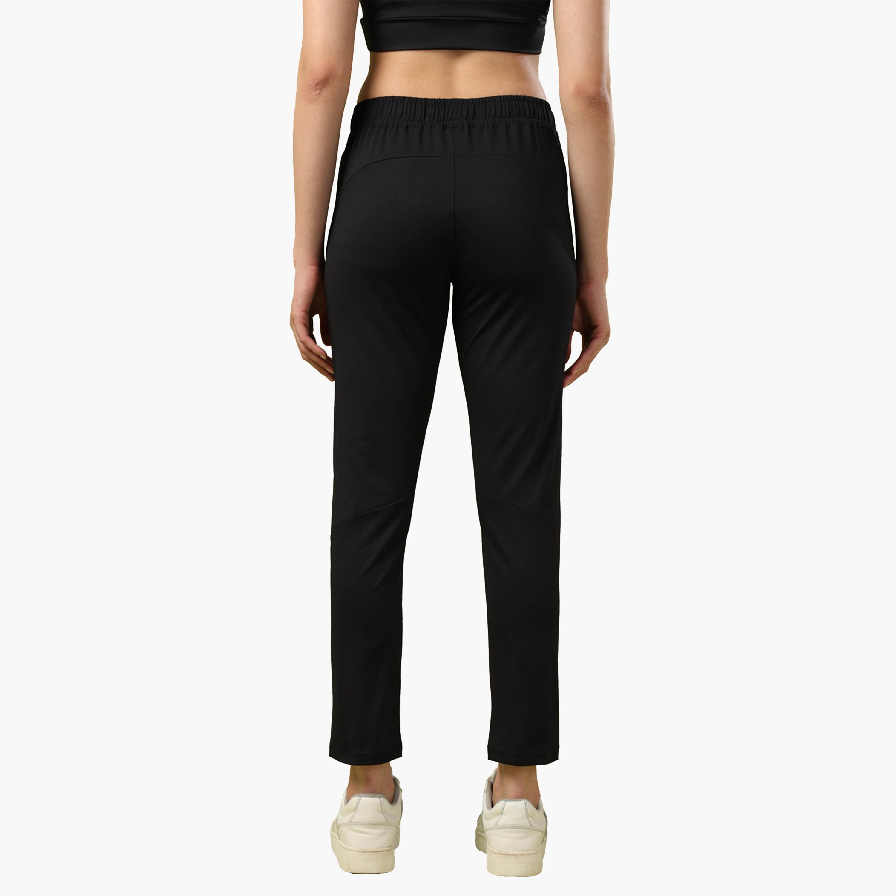 تيكنو سبورت × ستايلي - بنطال رياضي سادة بقصّة ضيقة مع جيوب-women-clothing-sportswearandactivewear-bottoms-image-2