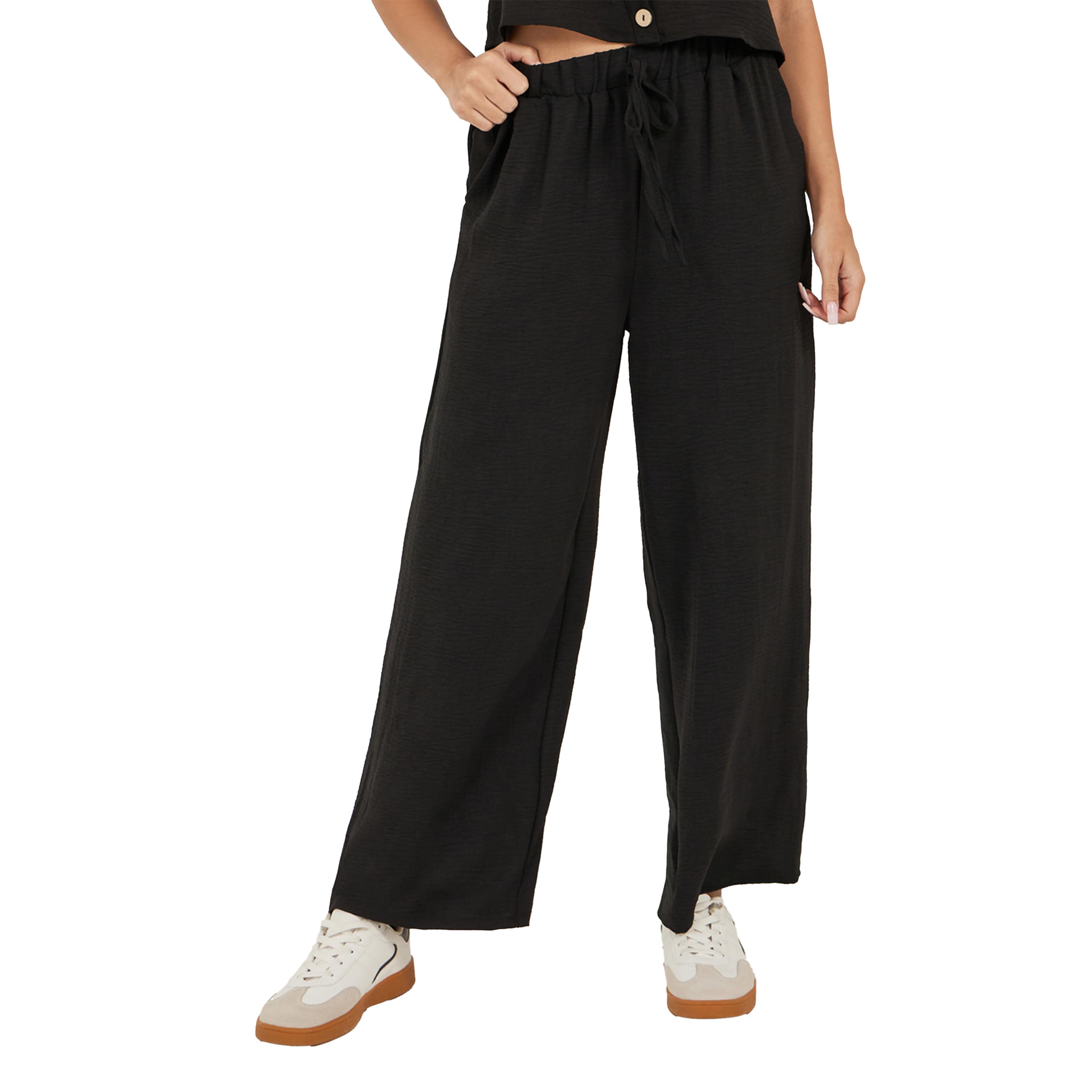 طقم منسق من بنطال بأرجل واسعة وبلوزة قصيرة بلا أكمام-women-clothing-coordsets-image-4