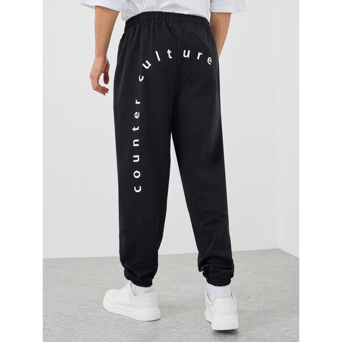 جوغر فضفاض بطبعة كتابة وأربطة-men-clothing-bottoms-joggers-image-2