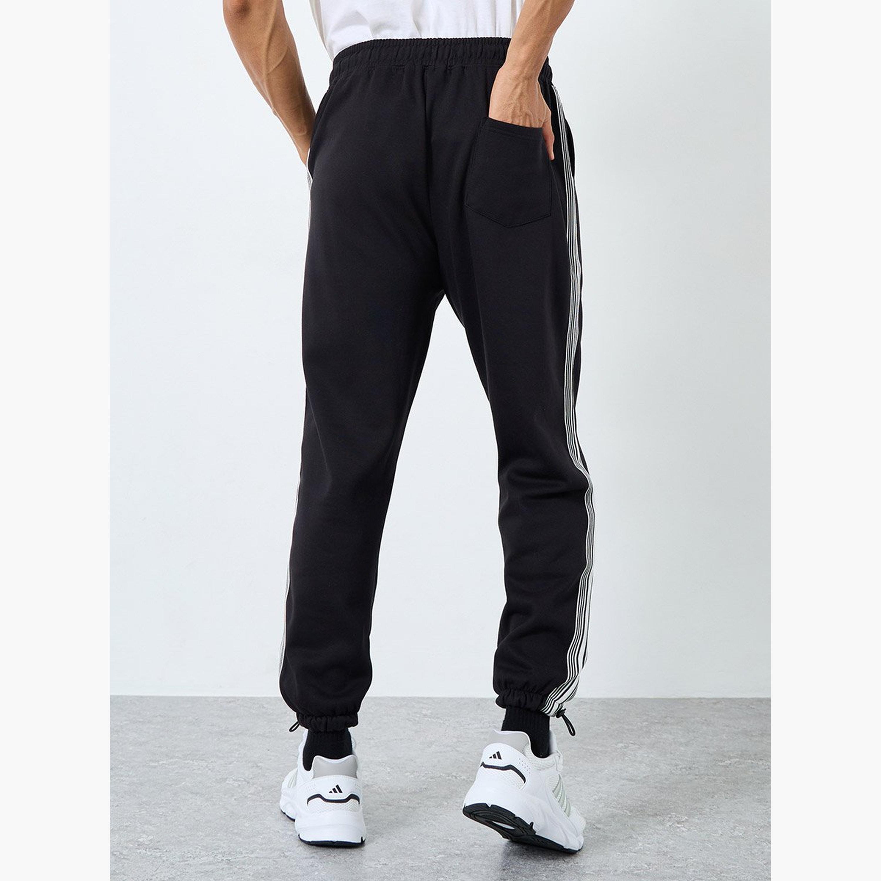 Styli Men Black Graphic Oversized Joggers with Tape Detail-men-clothing-sportswearandactivewear-bottoms-joggers-image-4