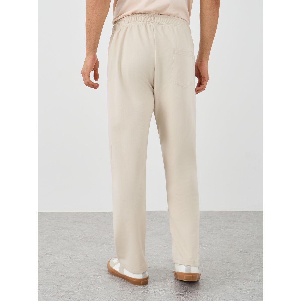 جوغر بقصة مريحة وطبعة كتابة مع حافة مفتوحة-men-clothing-bottoms-joggers-image-4