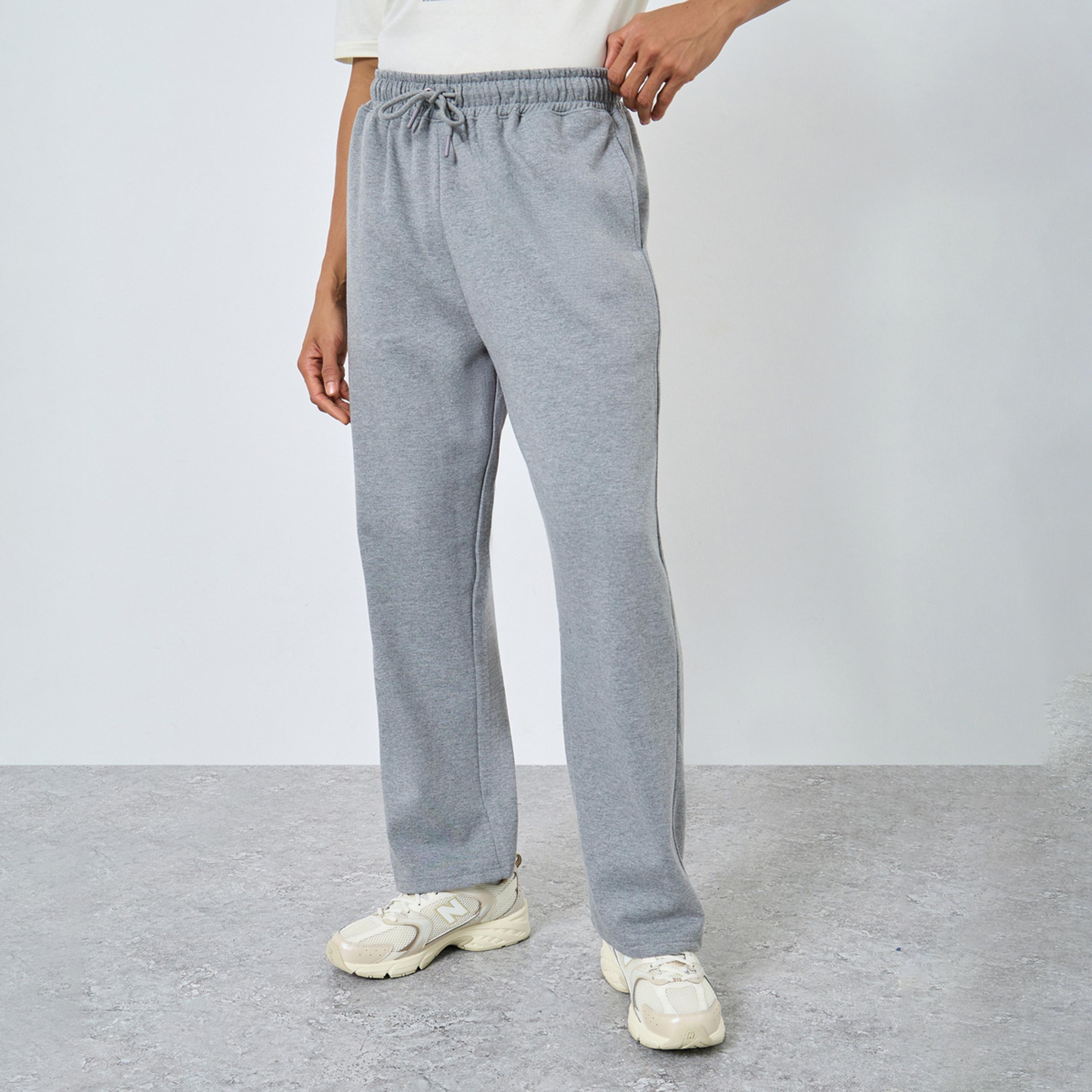 ستايلي - بنطال رياضي رجالي رمادي مقاس كبير اوفر سايز  برباط-men-clothing-bottoms-joggers-image-1