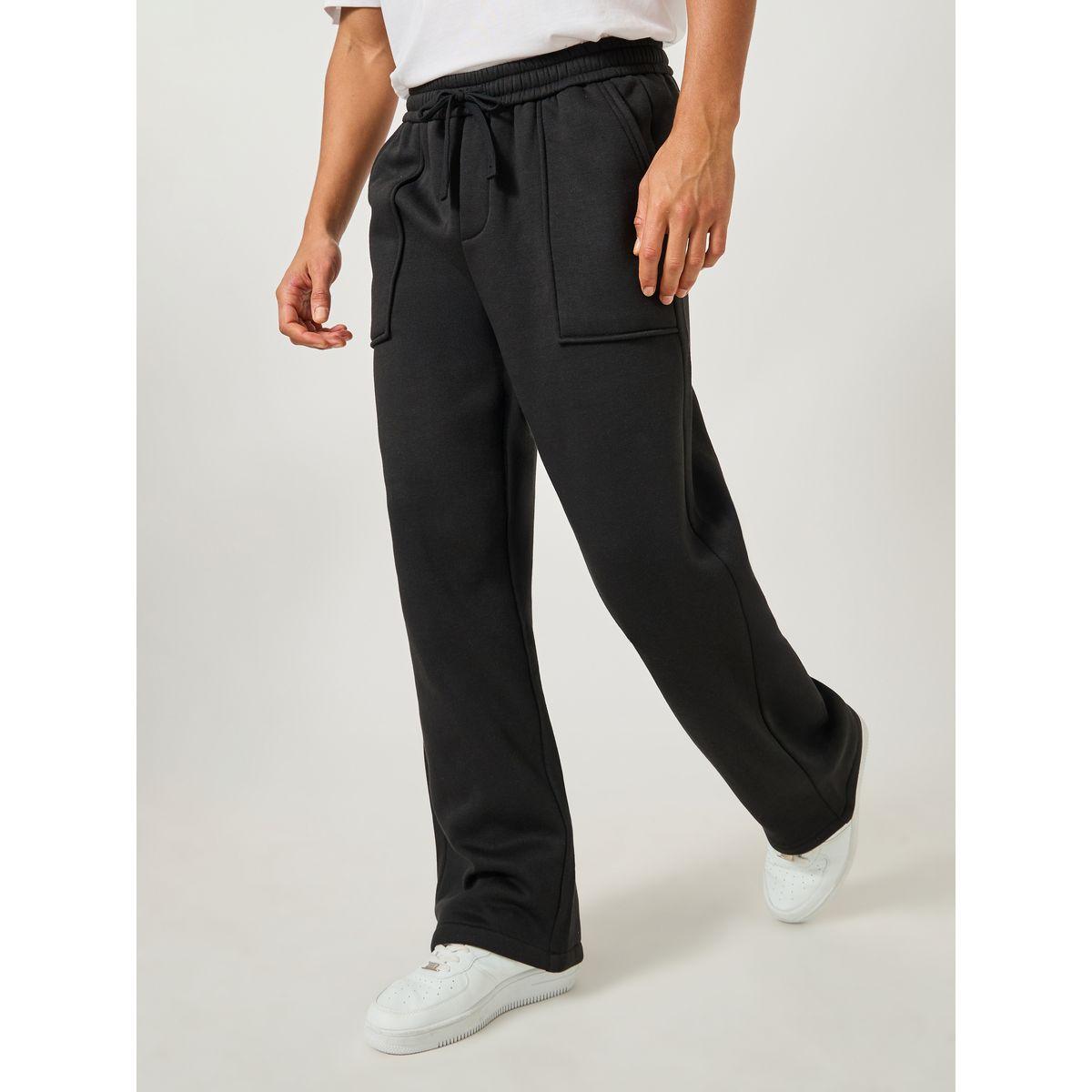 جوغر فضفاض بحافة مفتوحة وتفاصيل جيب-men-clothing-bottoms-joggers-image-1