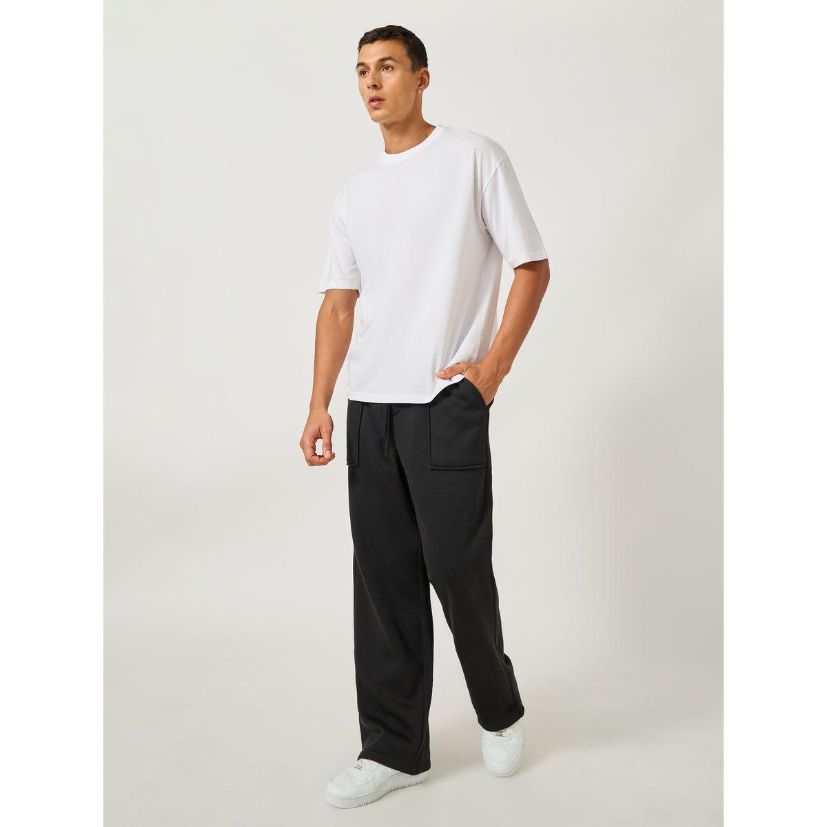 جوغر فضفاض بحافة مفتوحة وتفاصيل جيب-men-clothing-bottoms-joggers-image-2
