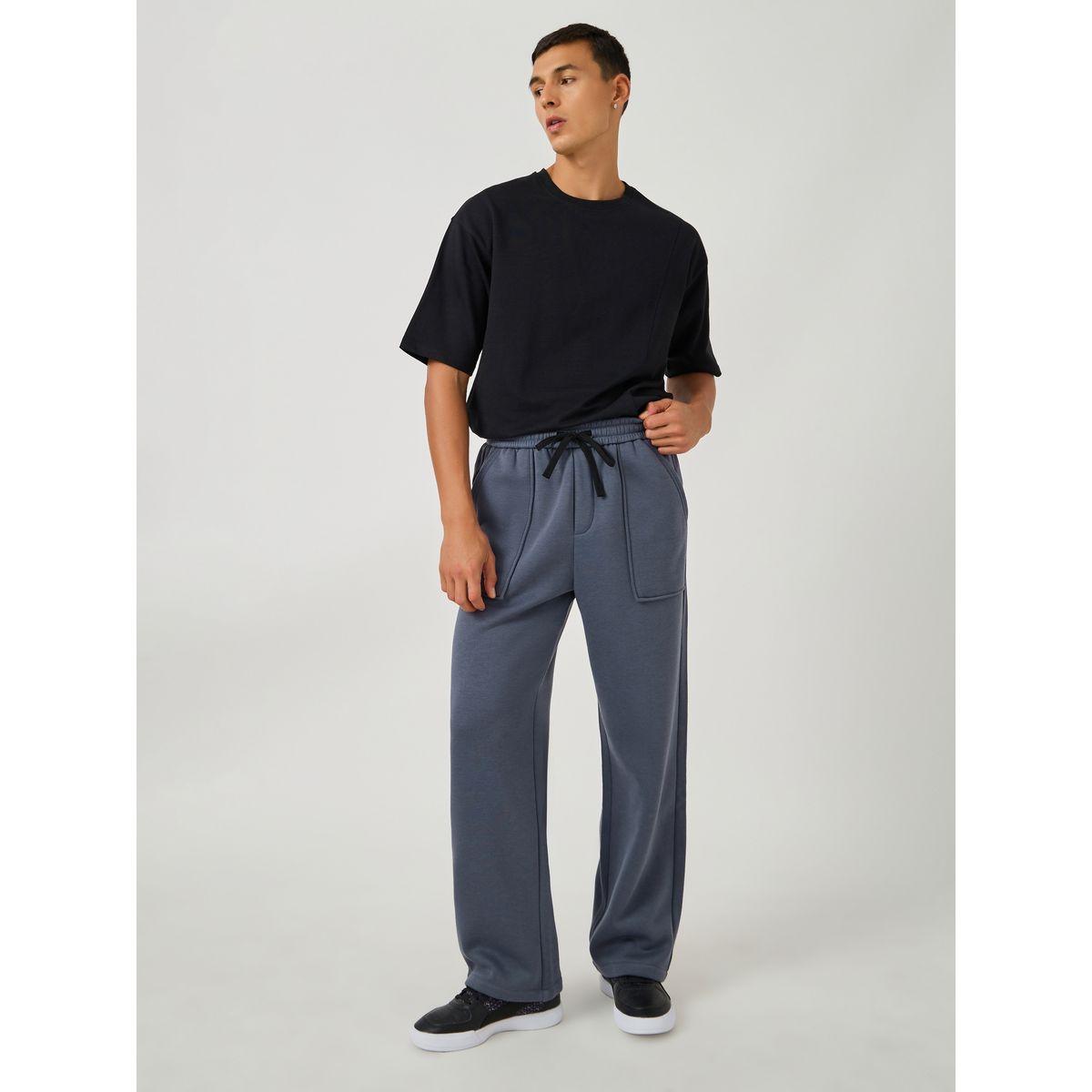 جوغر فضفاض بحافة مفتوحة وتفاصيل جيب-men-clothing-bottoms-joggers-image-2